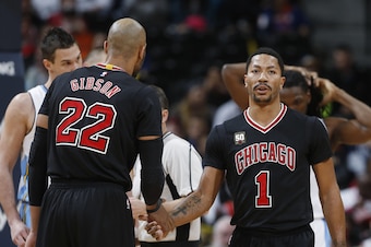 Taj Gibson and Derrick Rose