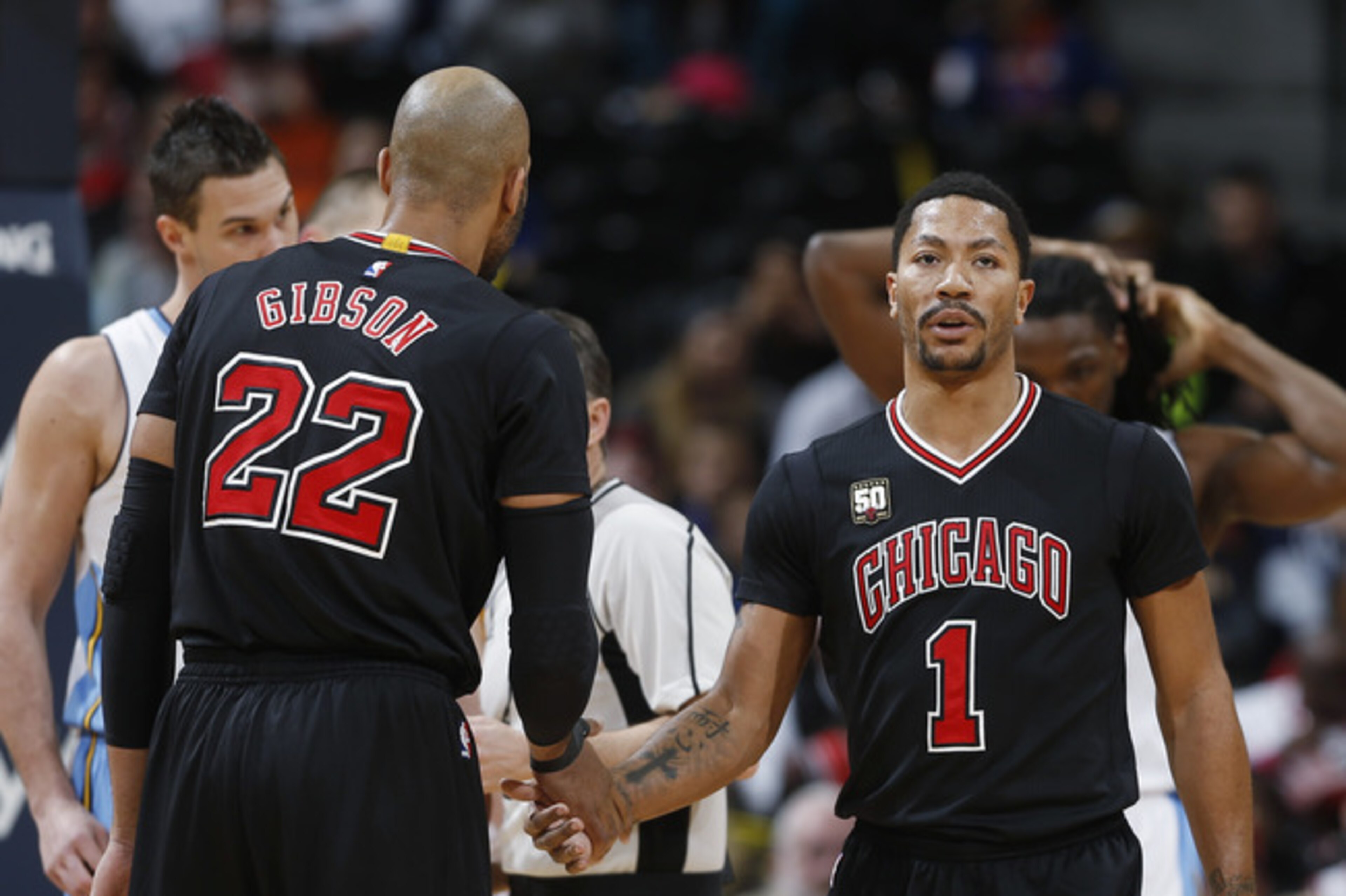 Taj Gibson and Derrick Rose
