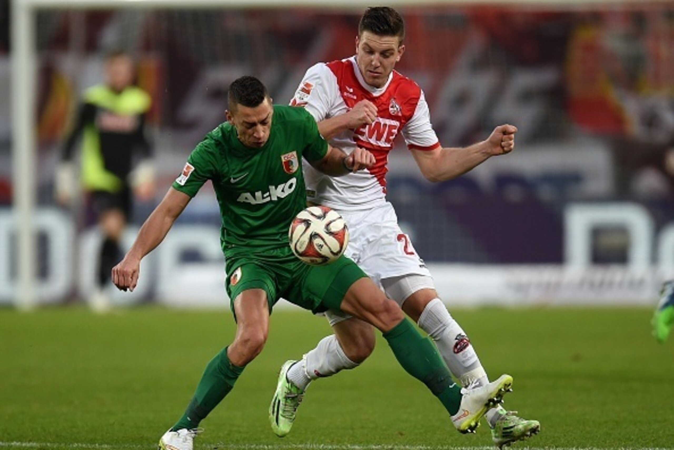 Augsburg's Serbian forward Nikola Djurdjic (L) and Cologne's Austrian defender Kevin Wimmer vie for the ball during the German first division Bundesliga football match 1 FC Cologne vs FC Augsburg in Cologne, western germany on December 6, 2014. AFP PHO Augsburg's Serbian forward Nikola Djurdjic (L) and Cologne's Austrian defender Kevin Wimmer vie for the ball during the German first division Bundesliga football match 1 FC Cologne vs FC Augsburg in Cologne, western germany on December 6, 2014. AFP PHO