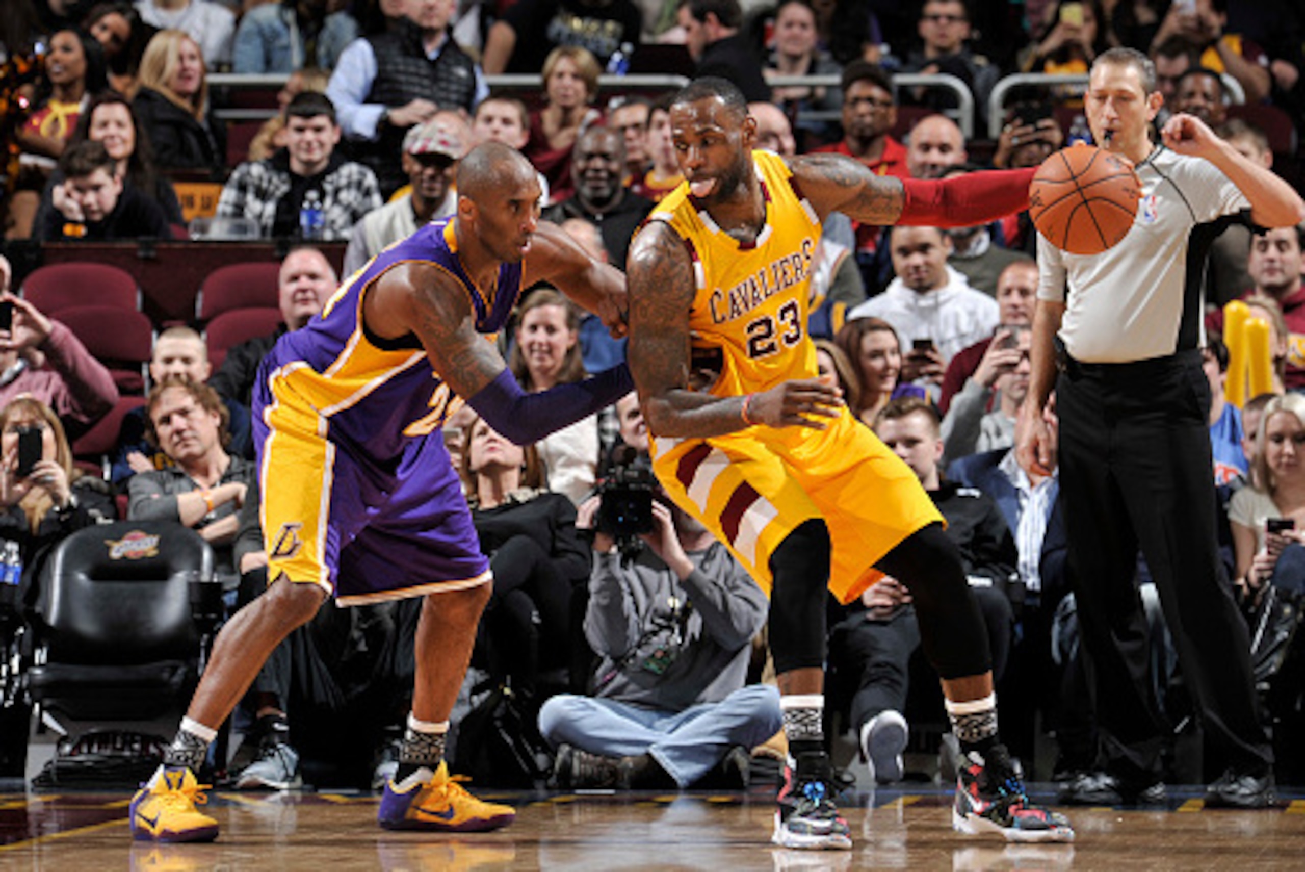 CLEVELAND, OH - FEBRUARY 10:  LeBron James #23 of the Cleveland Cavaliers handles the ball against Kobe Bryant #24 of the Los Angeles Lakers on February 10, 2016 at Quicken Loans Arena in Cleveland, Ohio.  NOTE TO USER: User expressly acknowledges and agr