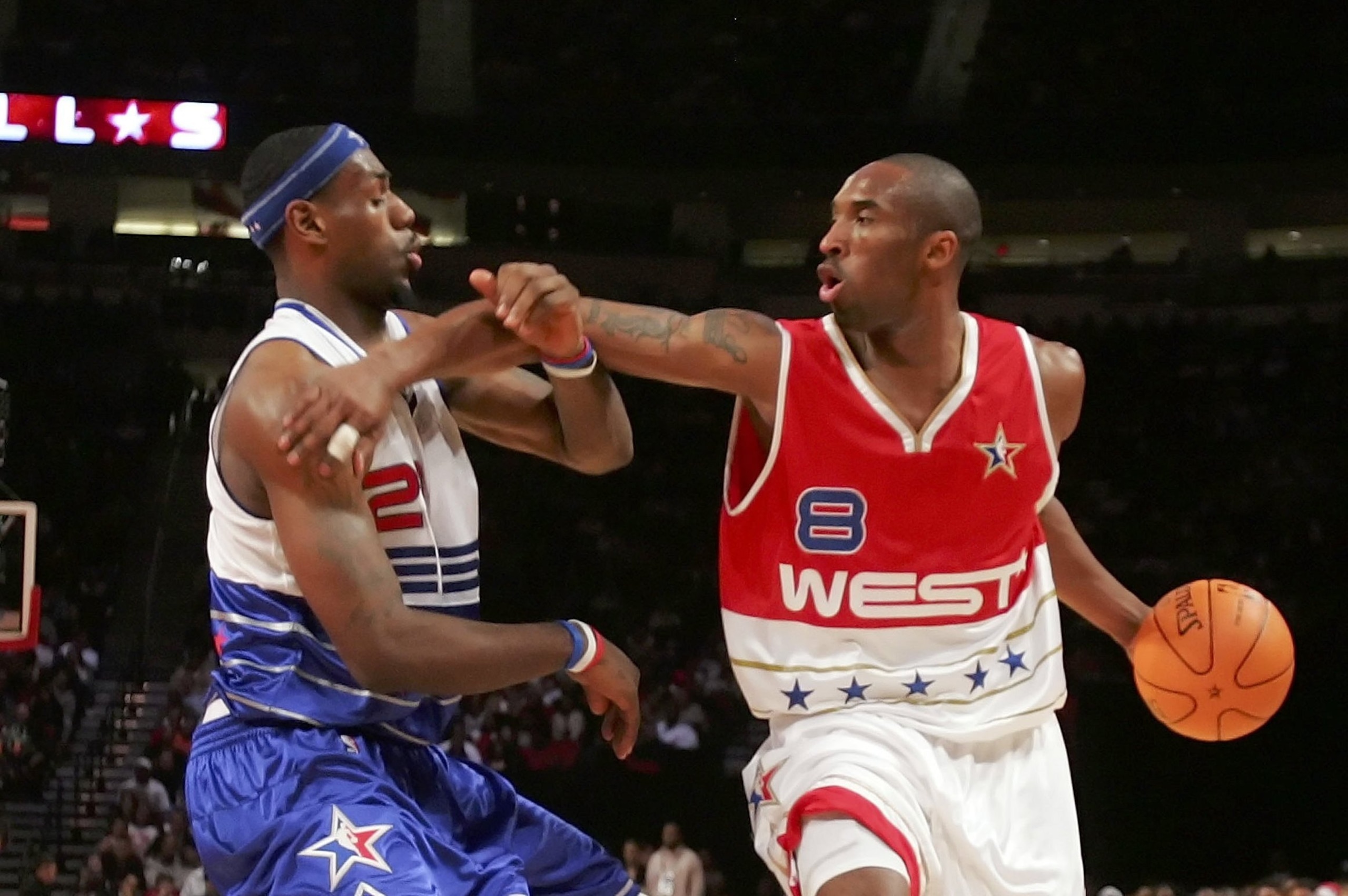 HOUSTON - FEBRUARY 19:  Kobe Bryant #8 of the West Team pushes LeBron James #23 of the East Team away during the second half of the 2006 NBA All-Star Game at the Toyota Center on February 19, 2006 in Houston, Texas. East defeated West 122-120.  NOTE TO US