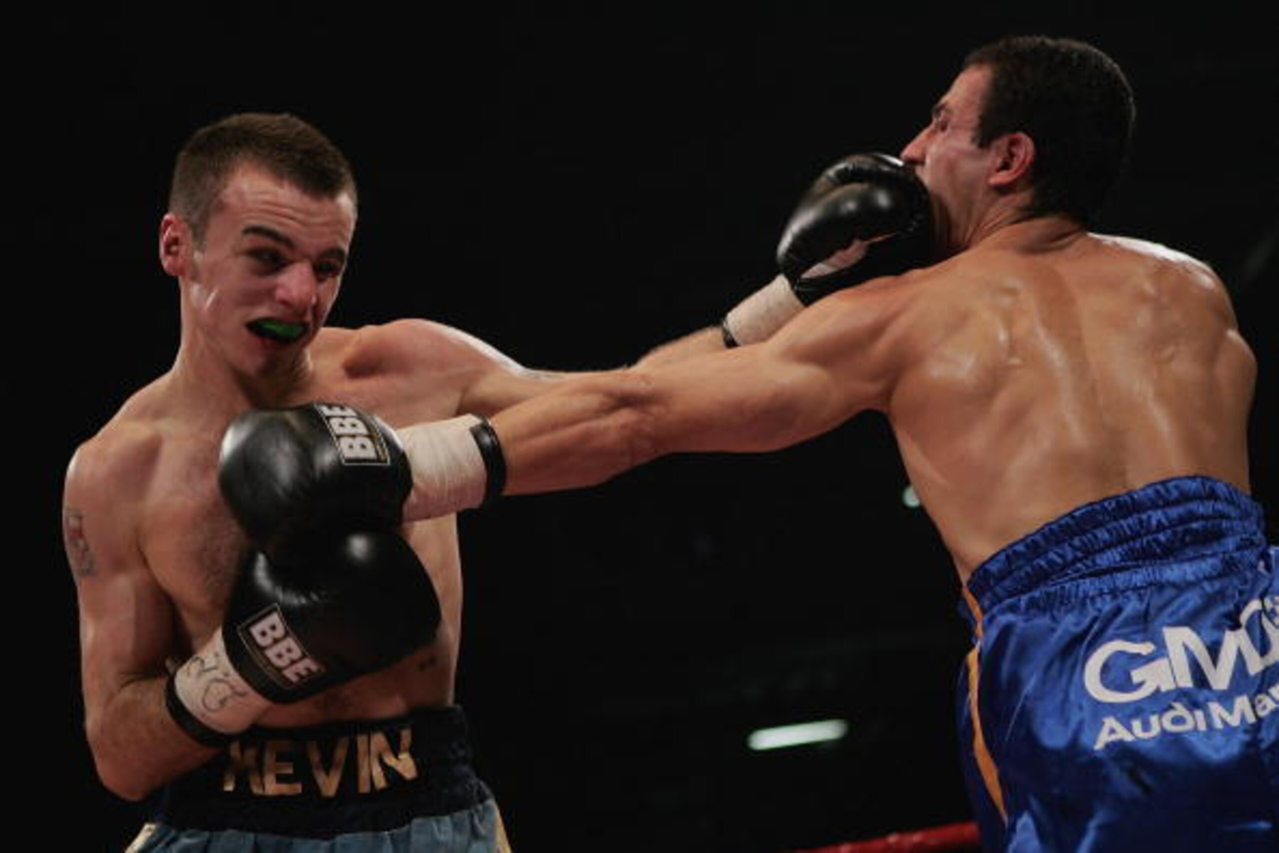 LONDON - DECEMBER 10:  Kevin Mitchell of England in action against Mohammed Medjadji of France during the vacant IBF Intercontinental Super-Featherweight Championship fight at the ExCel Centre on December 10, 2005 in London, England.  (Photo by John Gichi