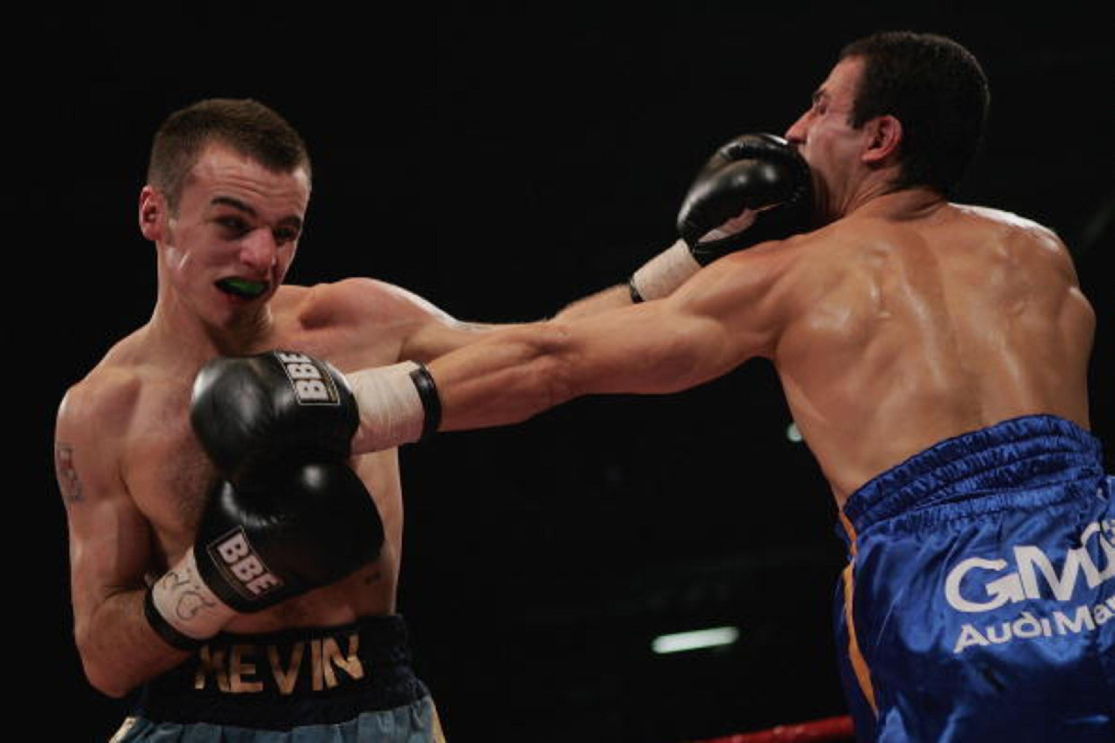 LONDON - DECEMBER 10:  Kevin Mitchell of England in action against Mohammed Medjadji of France during the vacant IBF Intercontinental Super-Featherweight Championship fight at the ExCel Centre on December 10, 2005 in London, England.  (Photo by John Gichi