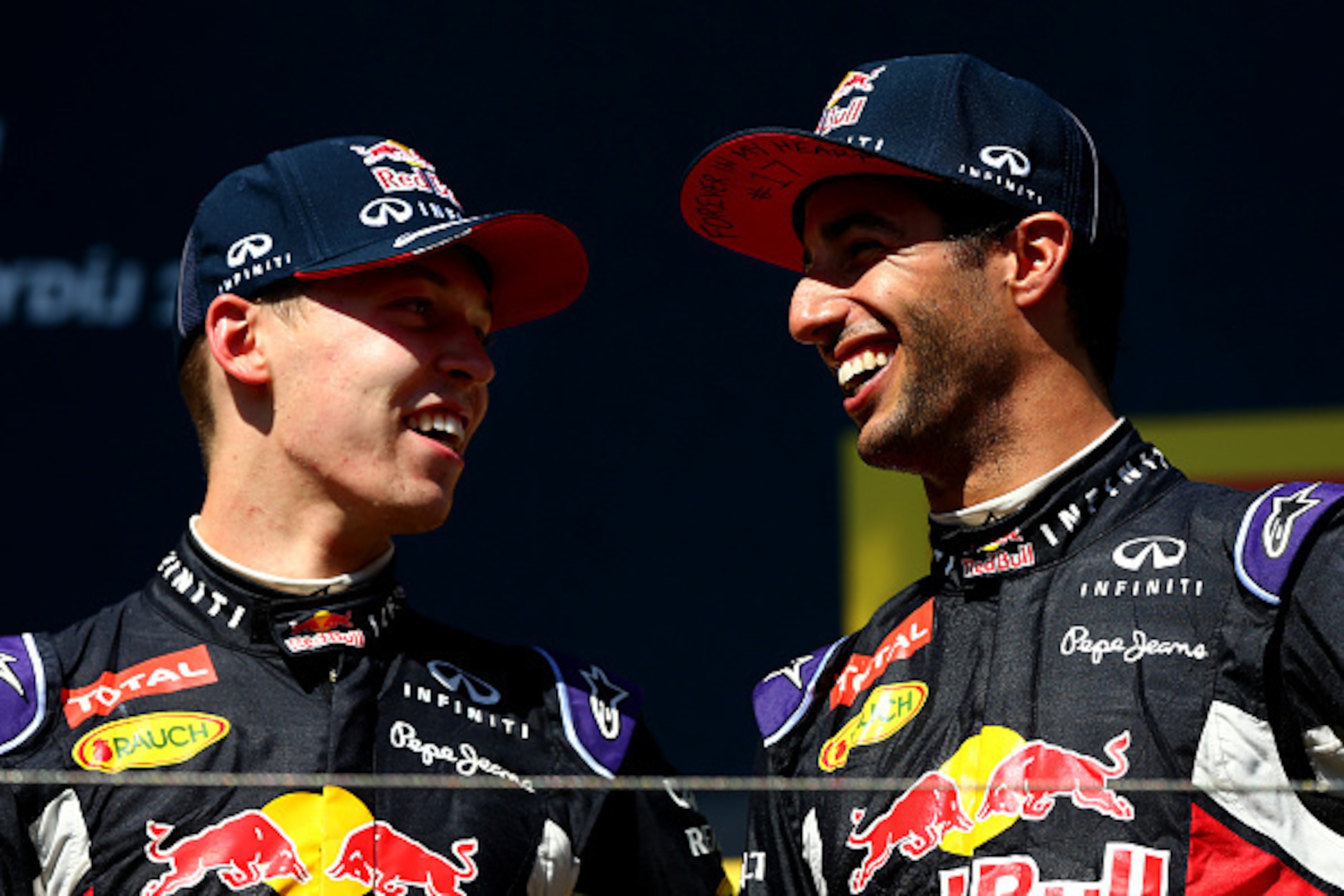 BUDAPEST, HUNGARY - JULY 26:  Daniel Ricciardo of Australia and Infiniti Red Bull Racing and Daniil Kvyat of Russia and Infiniti Red Bull Racing celebrate on the podium after finsihing third and second during the Formula One Grand Prix of Hungary at Hunga