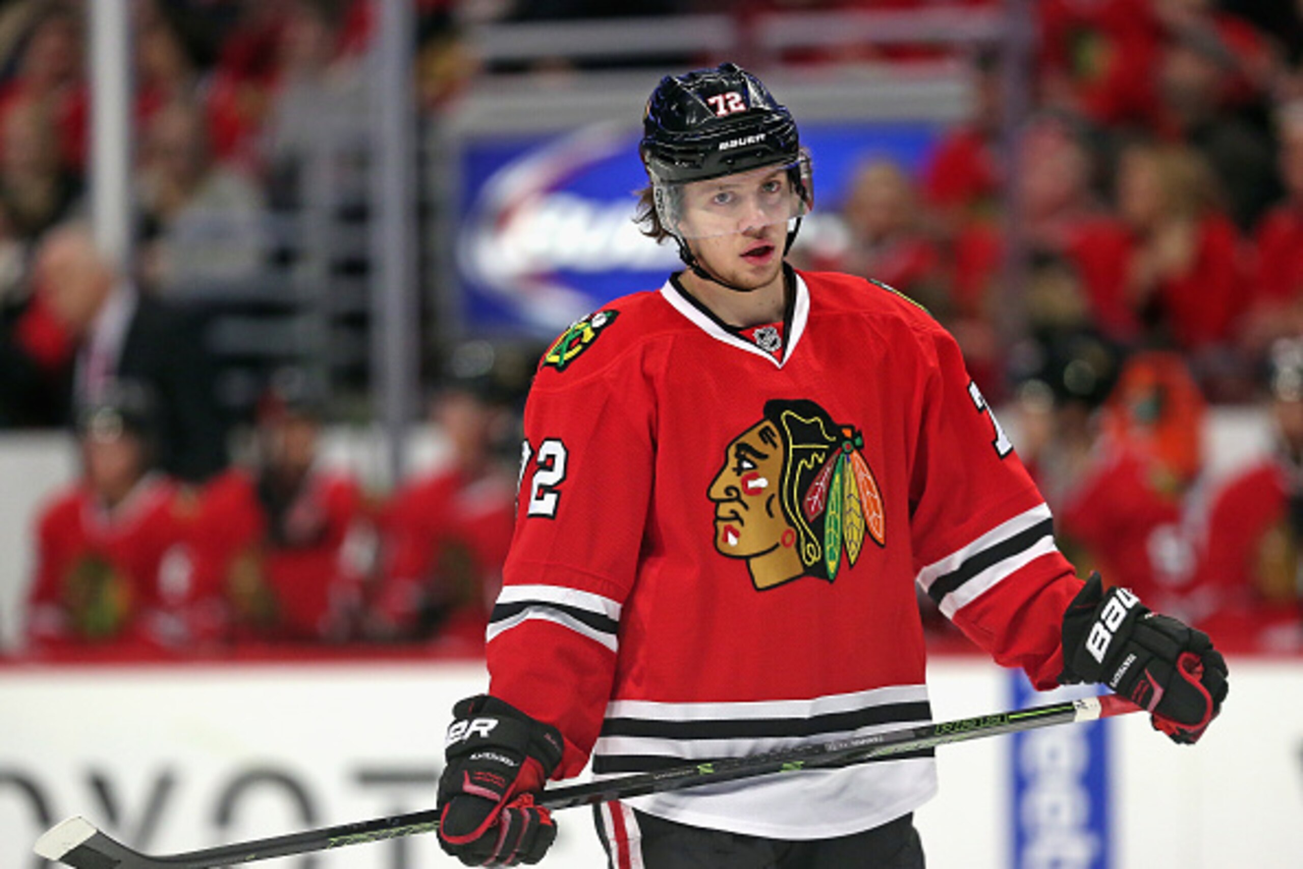 CHICAGO, IL - JANUARY 17:  Artemi Panarin #72 of the Chicago Blackhawks takes a break during a time-out against the Montreal Canadiens at the United Center on January 17, 2016 in Chicago, Illinois. The Blackhawks defeated the Canadiens 5-2.  (Photo by Jon