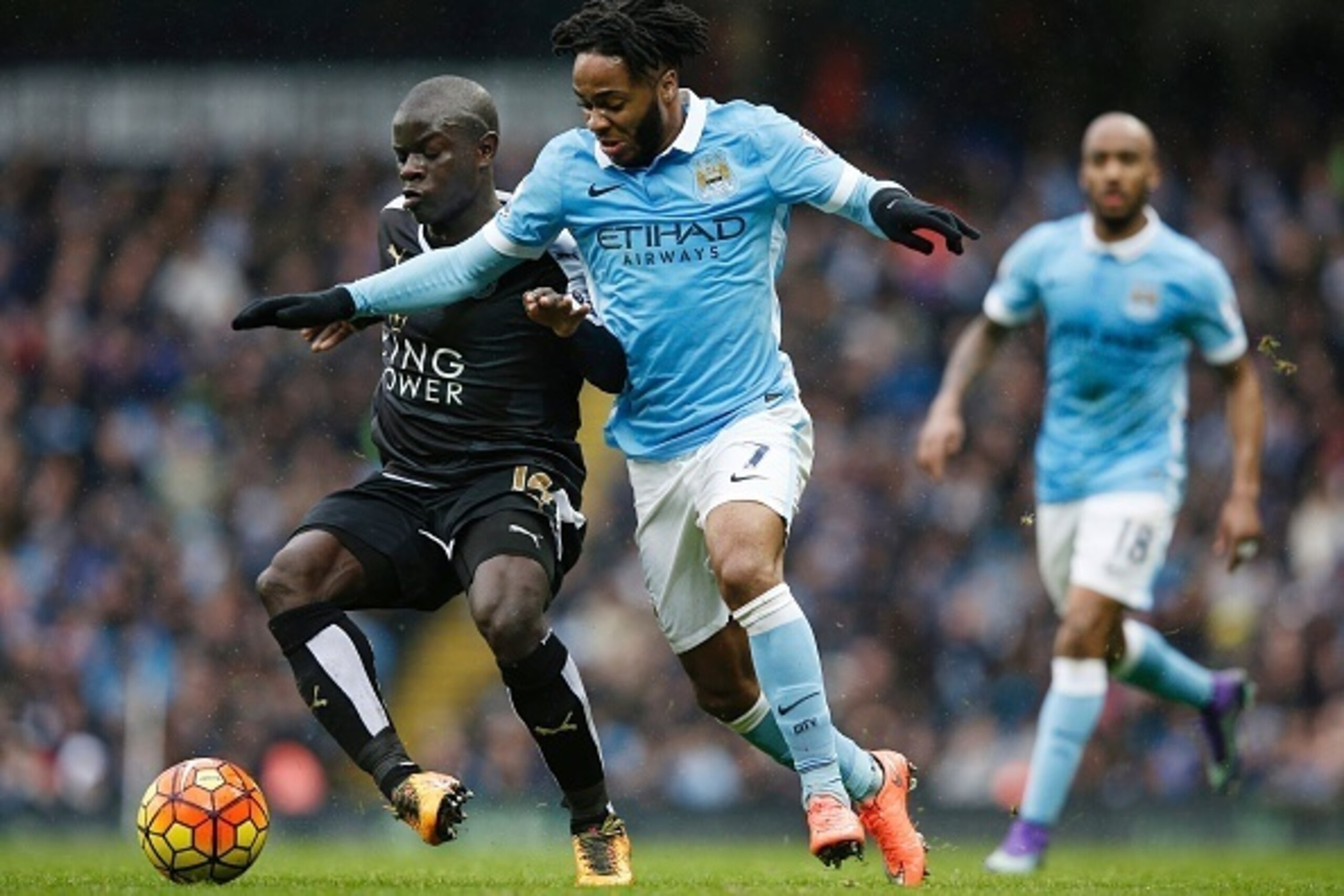 Leicester City's French midfielder N'Golo Kante (L) vies with Manchester City's English midfielder Raheem Sterling during the English Premier League football match between Manchester City and Leicester City at the Etihad Stadium in Manchester, north west 