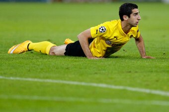 DORTMUND, GERMANY - SEPTEMBER 16:  Henrikh Mkhitaryan of Borussia Dortmund reacts during the UEFA Champions League Group D match between Borussia Dortmund and Arsenal at Signal Iduna Park on September 16, 2014 in Dortmund, Germany.  (Photo by Boris Streub