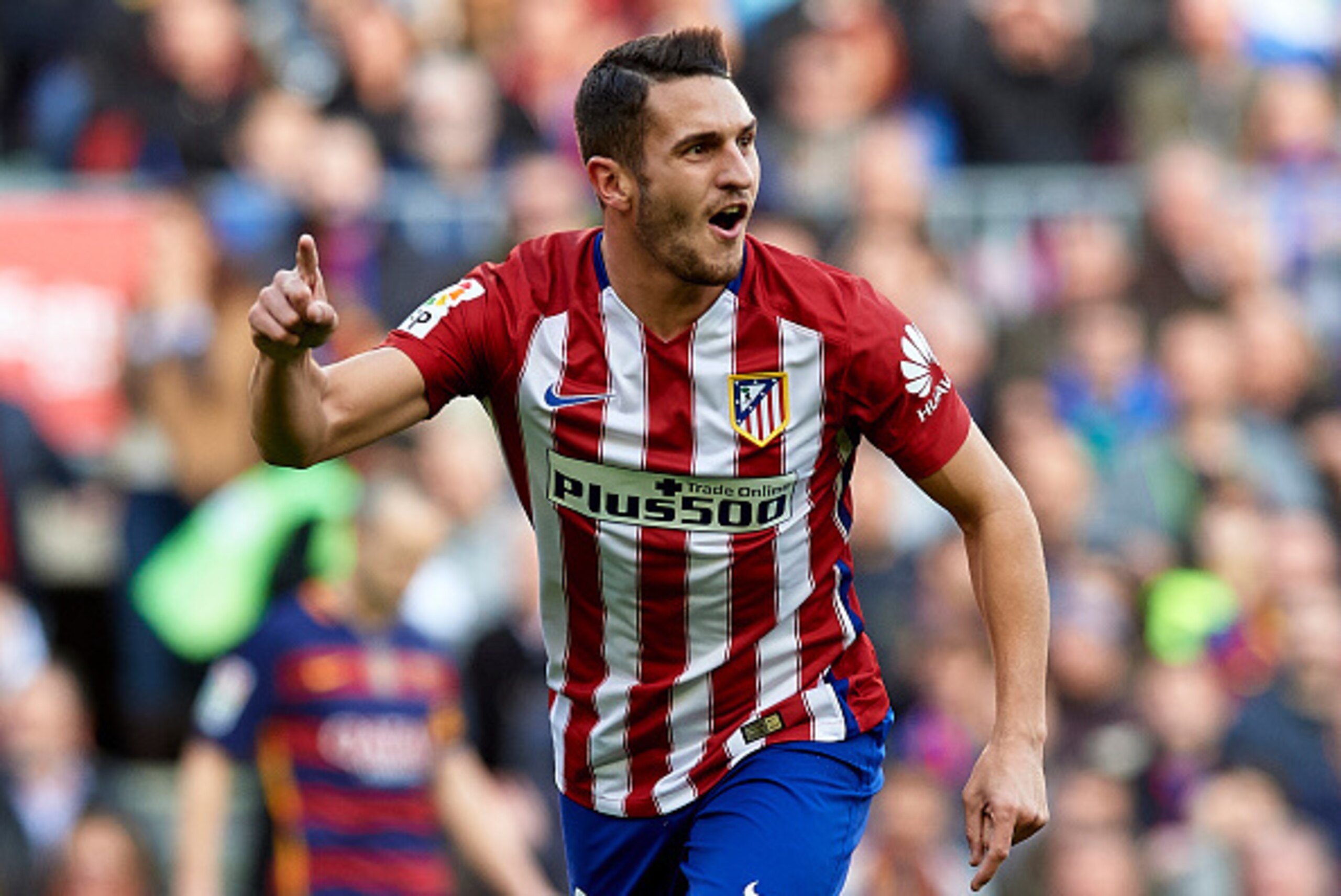 BARCELONA, SPAIN - JANUARY 30:  Koke of Atletico de Madrid celebrates scoring his team's first goal during the La Liga match between FC Barcelona and Atletico de Madrid at Camp Nou on January 30, 2016 in Barcelona, Spain.  (Photo by Manuel Queimadelos Alo