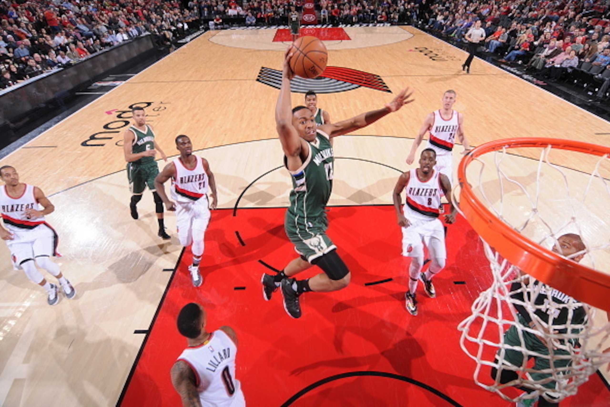 PORTLAND, OR - FEBRUARY 2: Jabari Parker #12 of the Milwaukee Bucks goes for the dunk against the Portland Trail Blazers during the game on February 2, 2016 at Moda Center in Portland,Oregon. NOTE TO USER: User expressly acknowledges and agrees that, by d