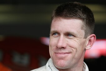 HOMESTEAD, FL - NOVEMBER 20:  Carl Edwards, driver of the #19 ARRIS Toyota, stands in the garage area during practice for the NASCAR Sprint Cup Series Ford EcoBoost 400 at Homestead-Miami Speedway on November 20, 2015 in Homestead, Florida.  (Photo by Bri