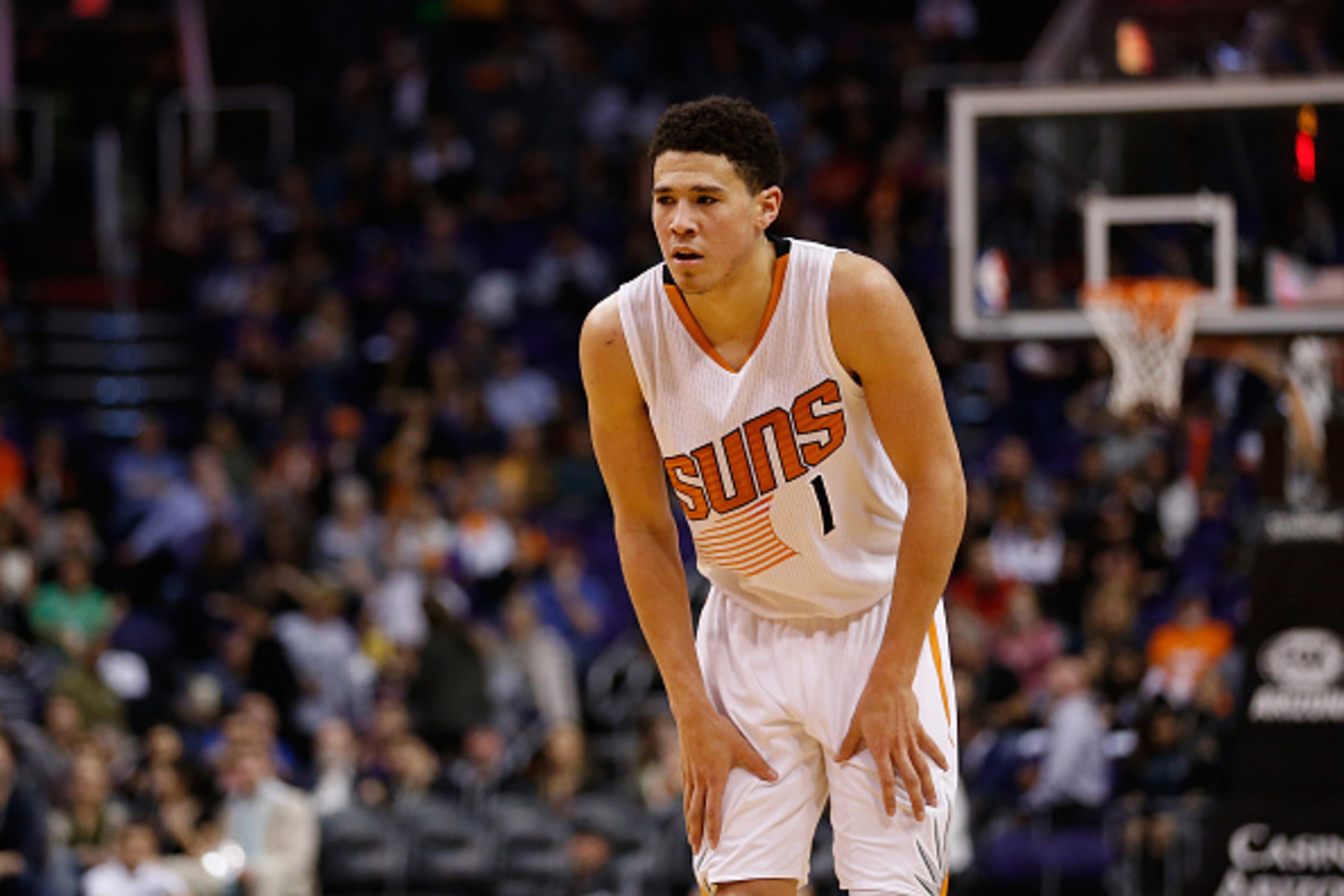 PHOENIX, AZ - JANUARY 19:  Devin Booker #1 of the Phoenix Suns during the second half of the NBA game against the Indiana Pacers at Talking Stick Resort Arena on January 19, 2016 in Phoenix, Arizona.  NOTE TO USER: User expressly acknowledges and agrees t