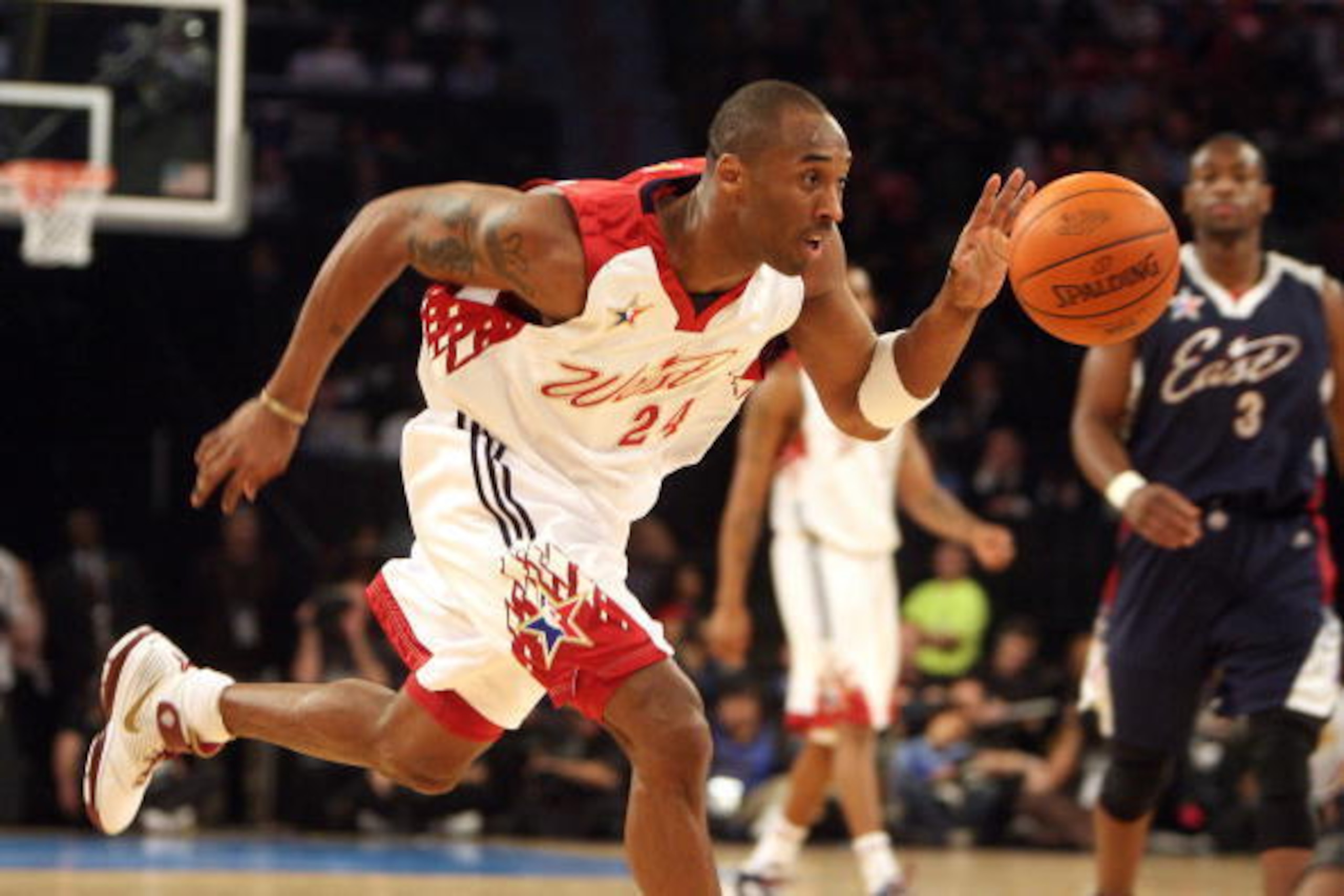 Las Vegas, UNITED STATES: The West's Kobe Bryant dribbles the ball as the East's Caron Butler (R) looks on during the NBA All Star Game, 18 February 2007, in Las Vegas, Nevada. Bryant scored 12 of his 31 points in the fourth quarter as the West came away 
