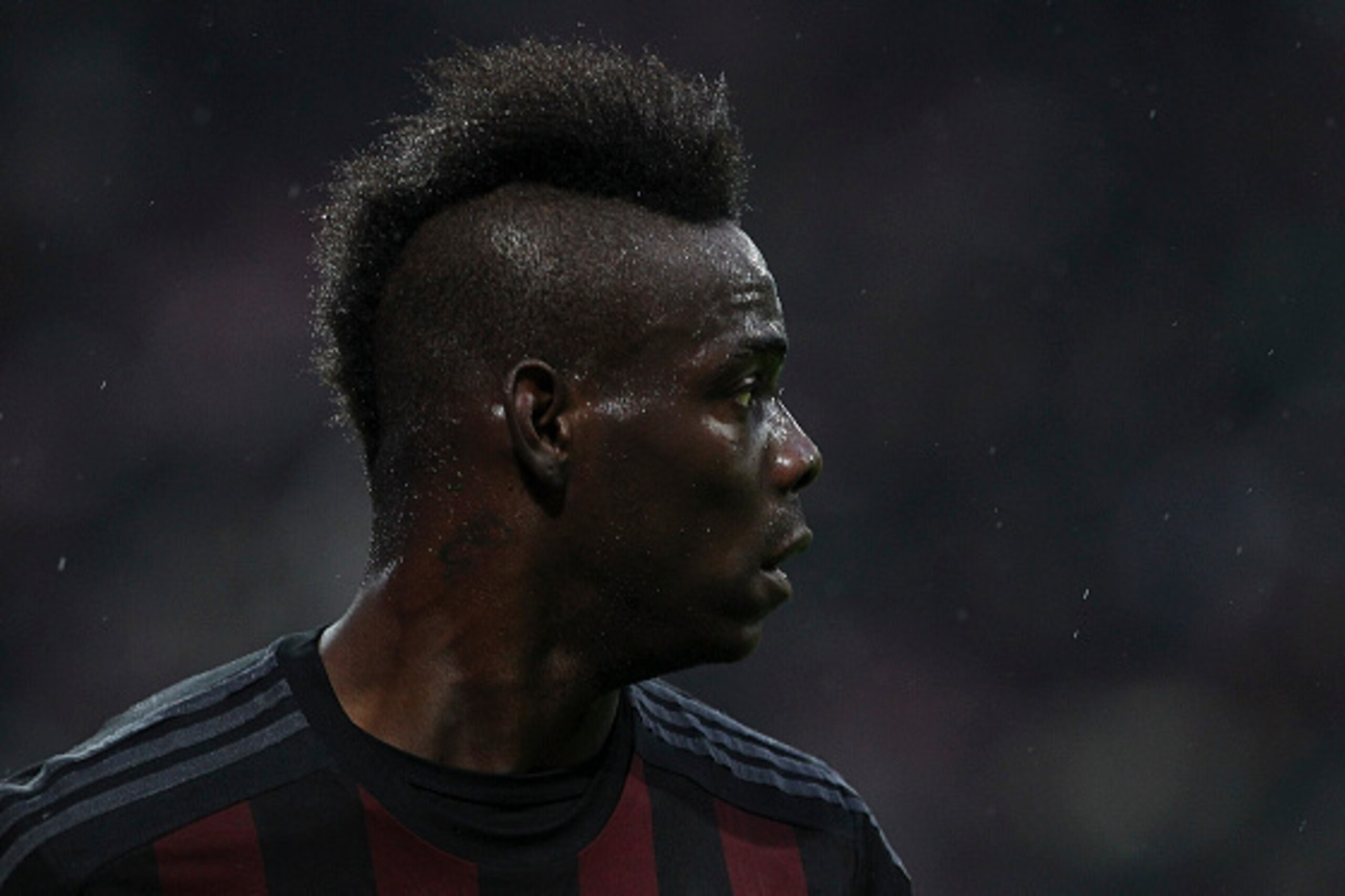 MILAN, ITALY - FEBRUARY 07:  Mario Balotelli of AC Milan looks on during the Serie A match between AC Milan and Udinese Calcio at Stadio Giuseppe Meazza on February 7, 2016 in Milan, Italy.  (Photo by Marco Luzzani/Getty Images)