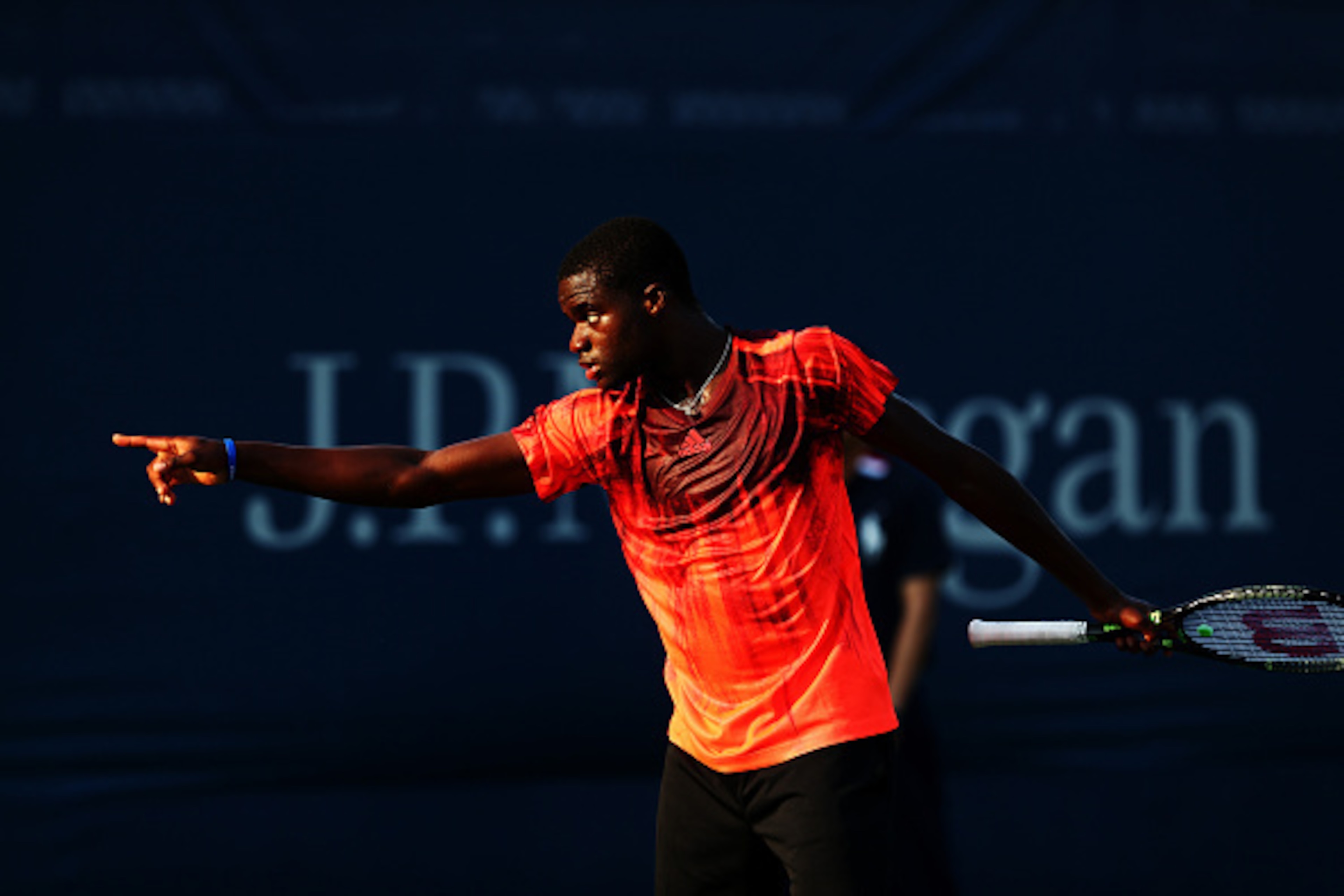 NEW YORK, NY - SEPTEMBER 01: Frances Tiafoe of the United States gestures against Viktor Troicki of Serbia during their Men's Singles First Round match on Day Two of the 2015 US Open at the USTA Billie Jean King National Tennis Center on September 1, 201 NEW YORK, NY - SEPTEMBER 01: Frances Tiafoe of the United States gestures against Viktor Troicki of Serbia during their Men's Singles First Round match on Day Two of the 2015 US Open at the USTA Billie Jean King National Tennis Center on September 1, 201
