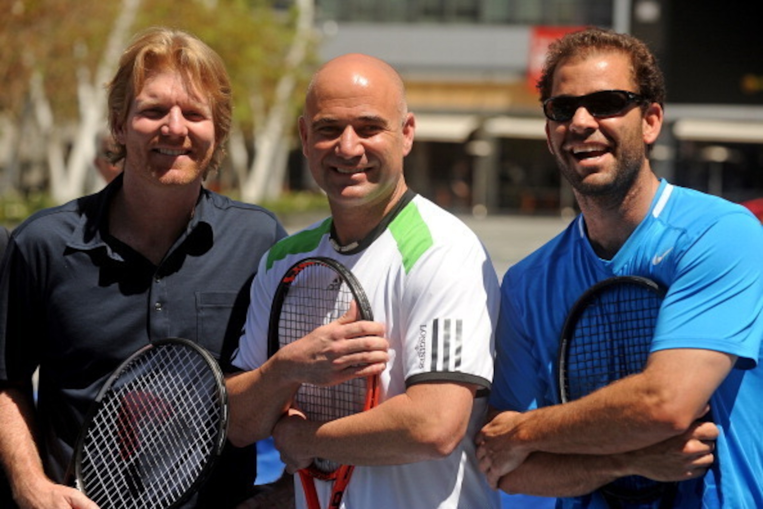 Tennis legends Jim Courier (L) Andre Agassi (C), Pete Sampras  pose together at a press conference to announce the Champions Series tennis tour, May 3, 2011 outside the Staples Center in downtown Los Angeles. In addition to Agassi, Sampras and Courier, th