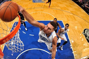 ORLANDO, FL - OCTOBER 13: Aaron Gordon #00 of the Orlando Magic dunks against the Miami Heat during a preseason game on October 13, 2015 at Amway Center in Orlando, Florida. NOTE TO USER: User expressly acknowledges and agrees that, by downloading and or 