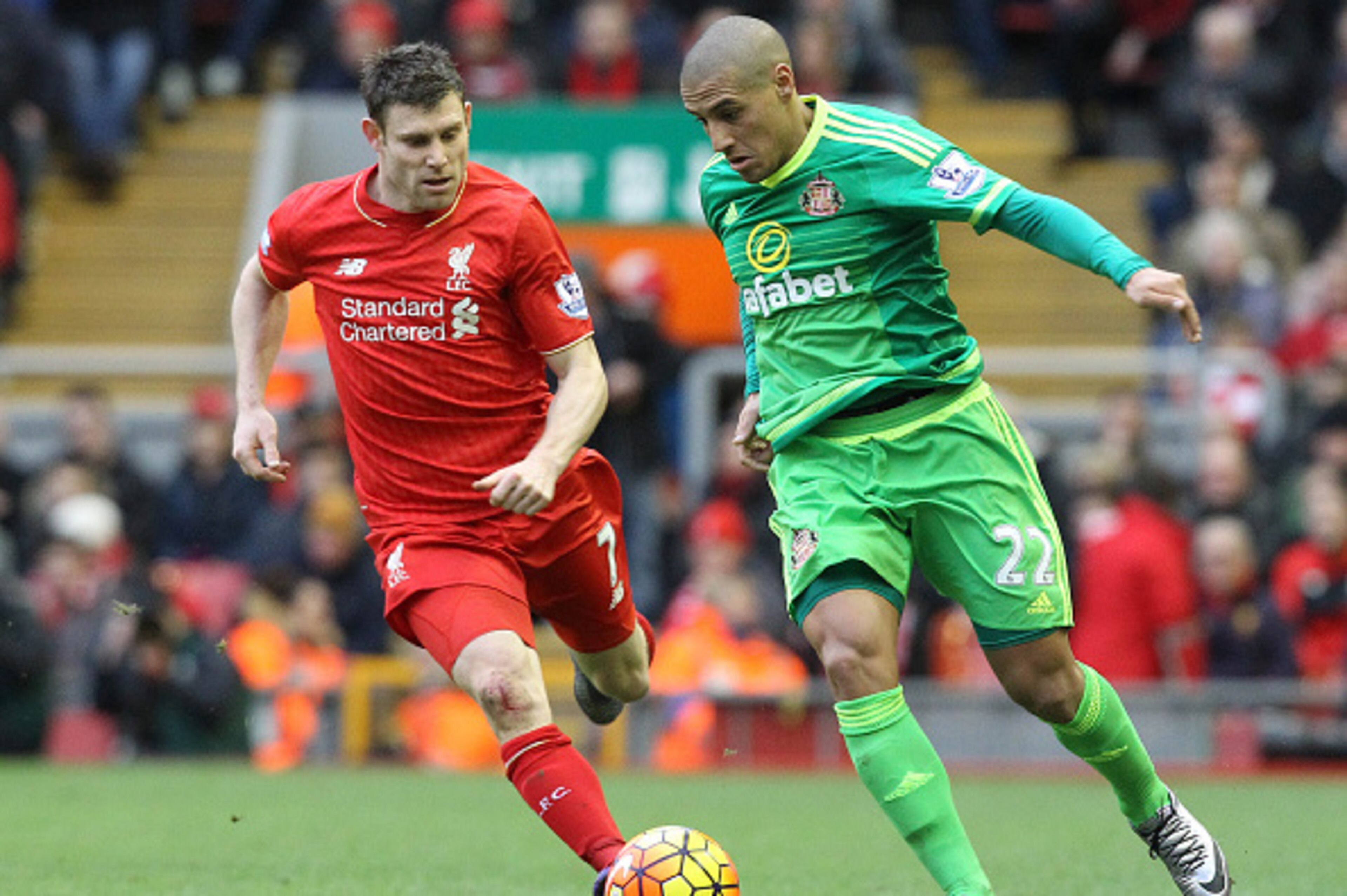 Liverpool's English midfielder James Milner (L) vies with Sunderlands Tunisian midfielder Wahbi Khazri during the English Premier League football match between Liverpool and Sunderland at the Anfield stadium in Liverpool, Merseyside England on February 6t Liverpool's English midfielder James Milner (L) vies with Sunderlands Tunisian midfielder Wahbi Khazri during the English Premier League football match between Liverpool and Sunderland at the Anfield stadium in Liverpool, Merseyside England on February 6t