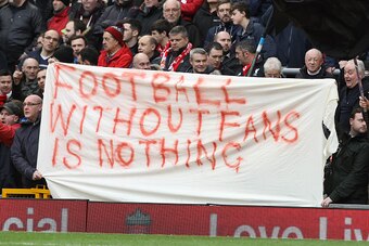 Liverpool fans hold a banner as they protest against the recently announced rise in ticket prices during the English Premier League football match between Liverpool and Sunderland at Anfield in Liverpool, northwest England, on February 6, 2016. / AFP / LI