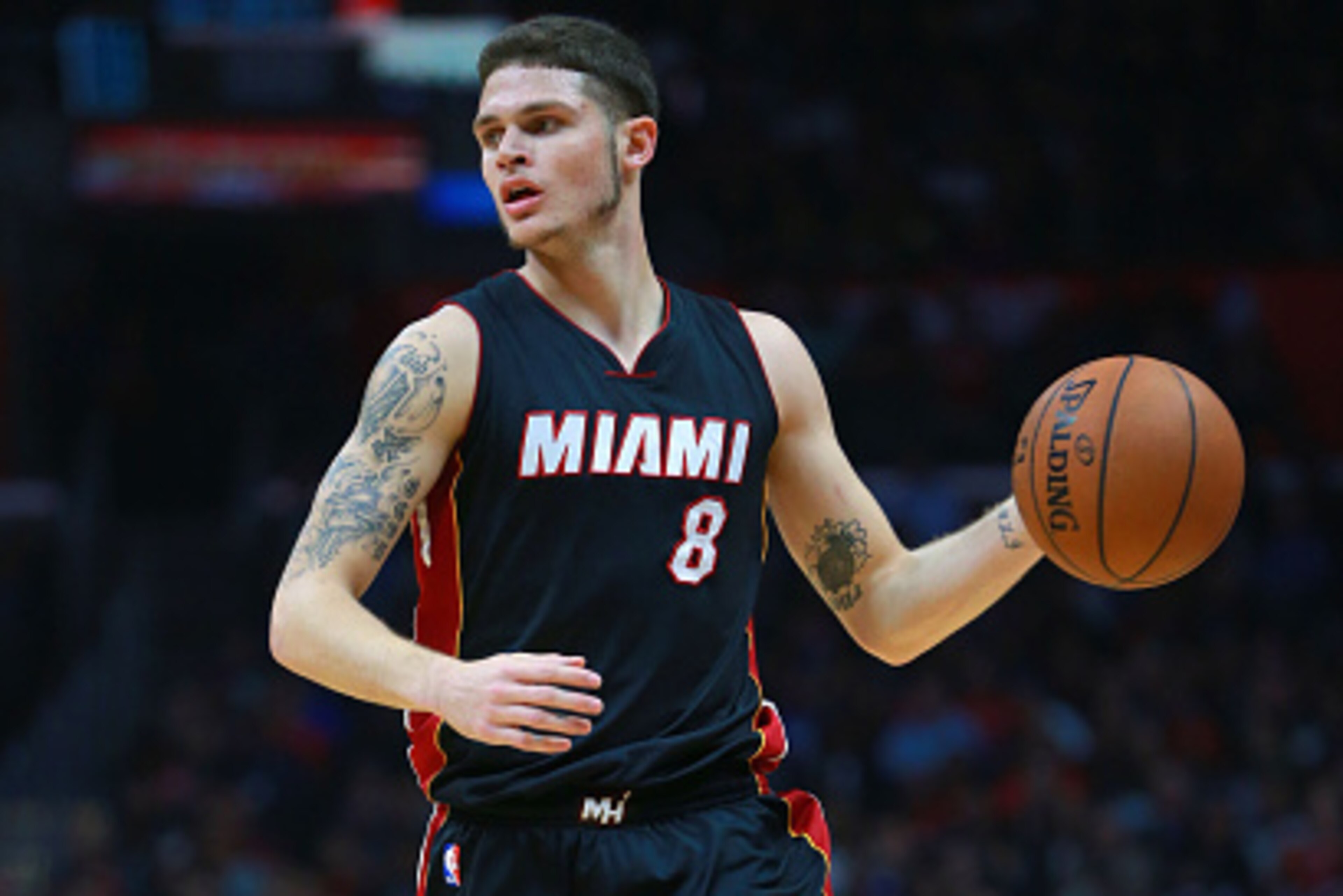 LOS ANGELES, CA - JANUARY 13:  Tyler Johnson #8 of the Miami Heat dribbles the ball upcourt during the NBA game between the Miami Heat and the Los Angeles Clippers at Staples Center on January 13, 2016 in Los Angeles, California. The Clippers defeated the