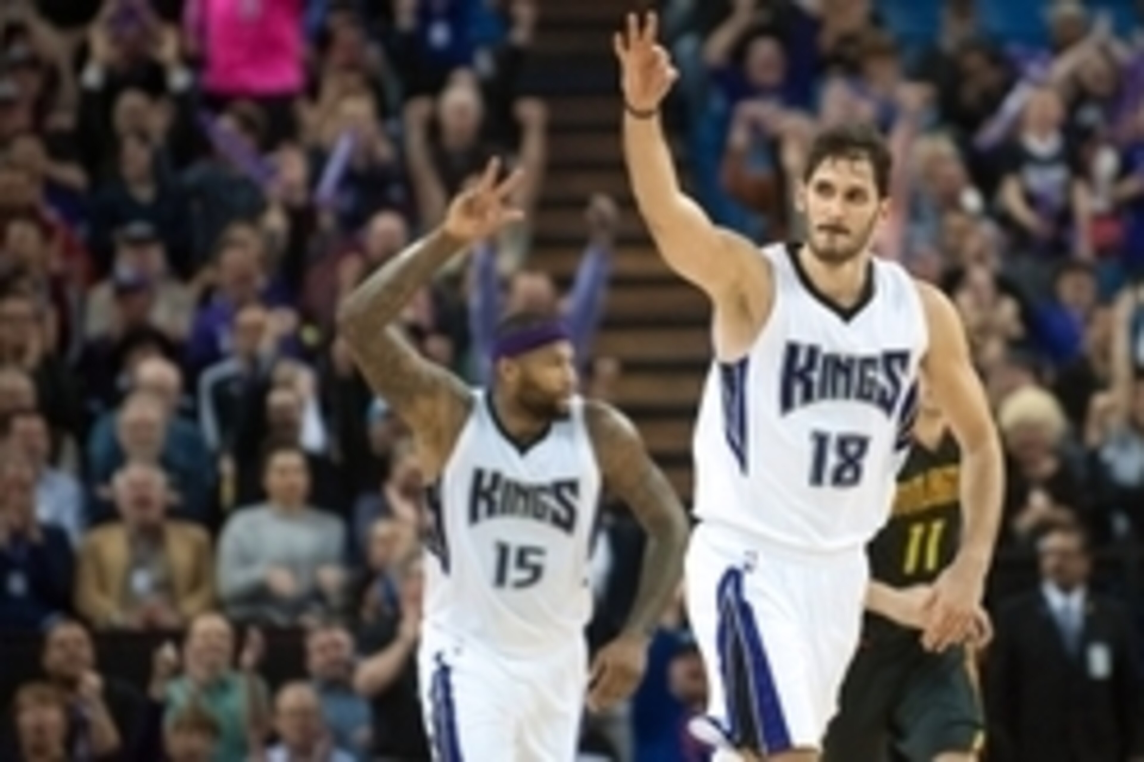 Jan 21, 2016; Sacramento, CA, USA; Sacramento Kings forward Omri Casspi (18) holds up three fingers after making a three point shot against the Atlanta Hawks during the fourth quarter at Sleep Train Arena. The Sacramento Kings defeated the Atlanta Hawks 9