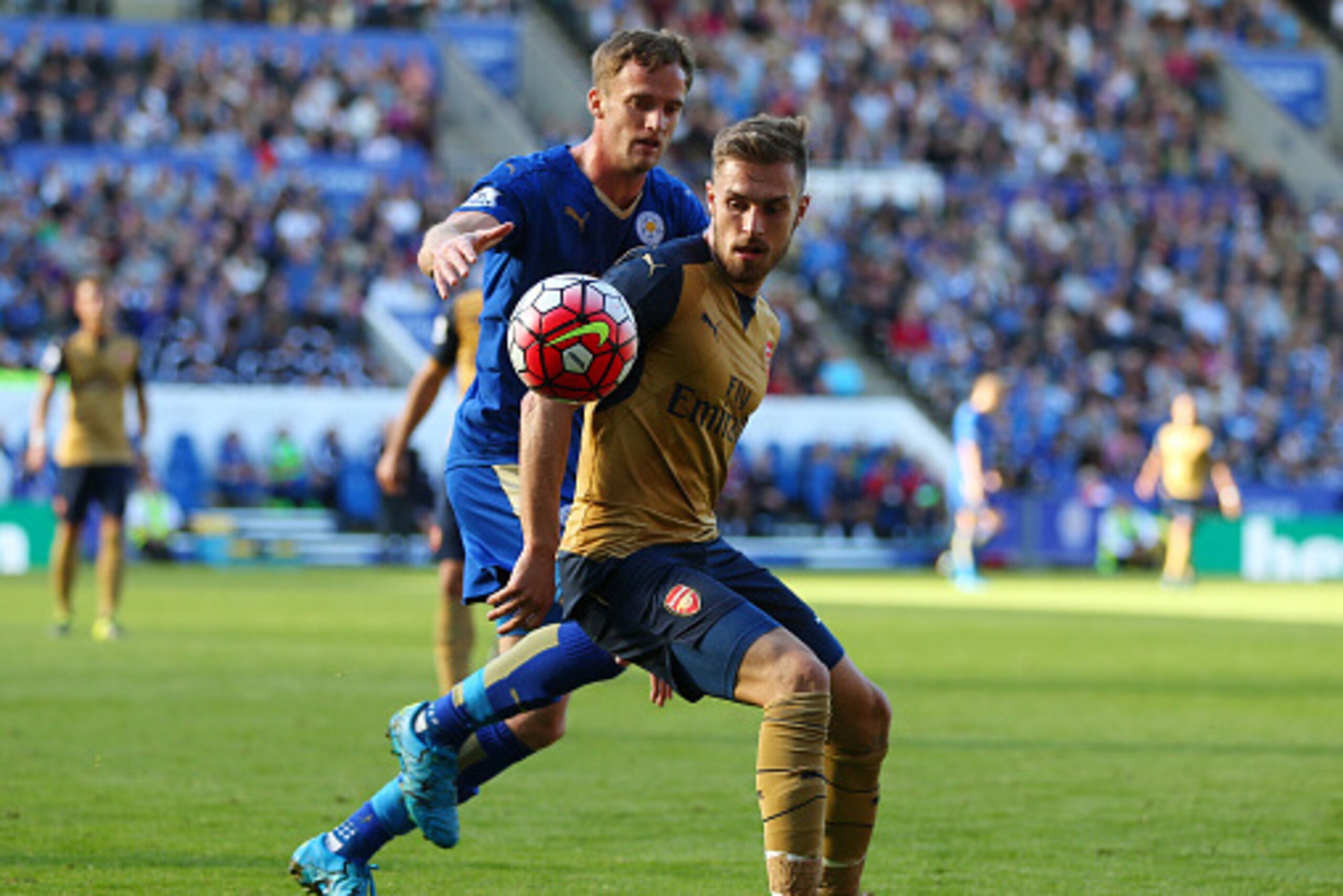 LEICESTER, ENGLAND - SEPTEMBER 26:  Aaron Ramsey of Arsenal and Andy King of Leicester City during the Barclays Premier League match between Leicester City and Arsenal at The King Power Stadium on September 26, 2015 in Leicester, United Kingdom.  (Photo b