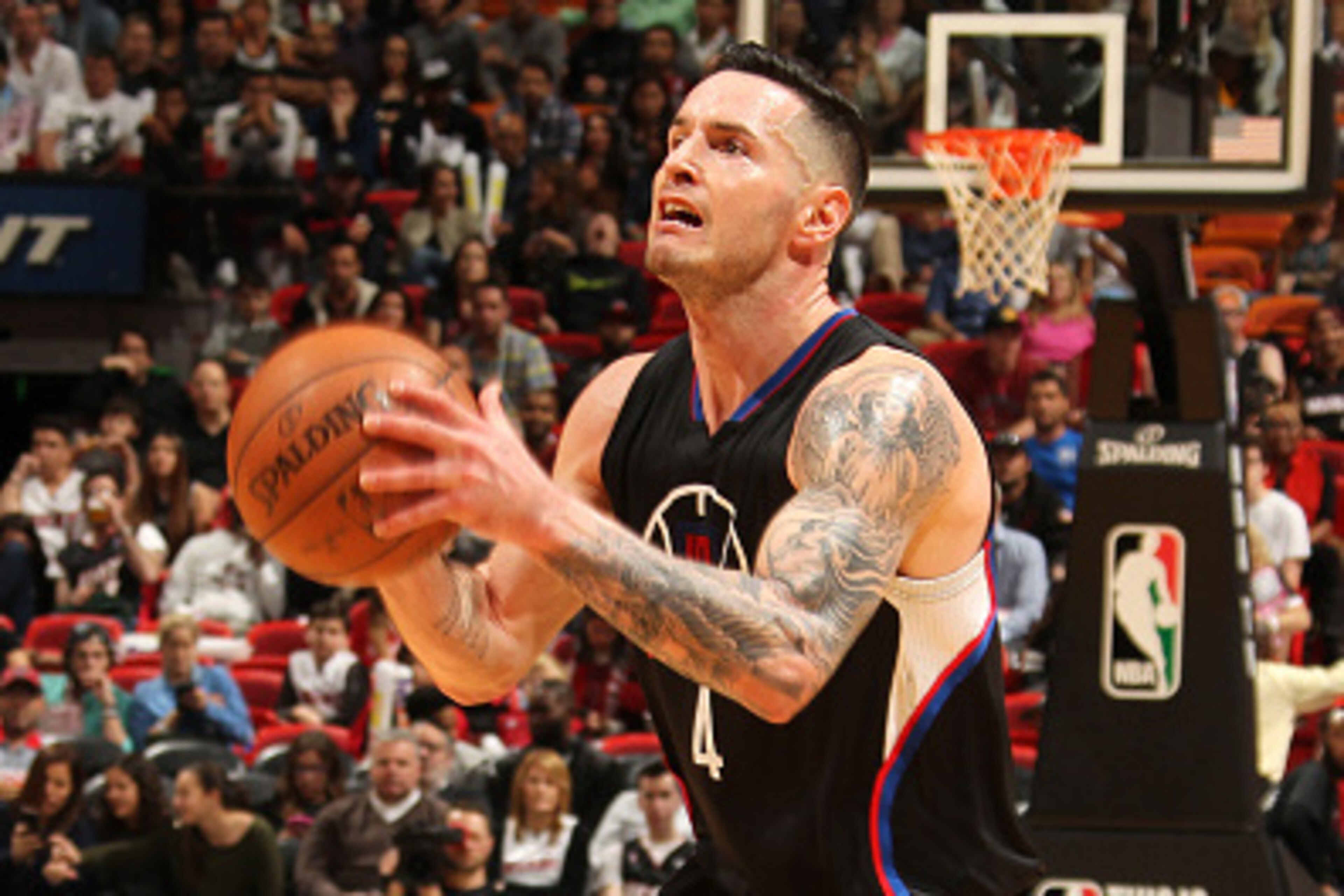 MIAMI, FL - FEBRUARY 7: J.J. Redick #4 of the Los Angeles Clippers handles the ball during the game against the Miami Heat on February 7, 2016 at AmericanAirlines Arena in Miami, Florida. NOTE TO USER: User expressly acknowledges and agrees that, by downl MIAMI, FL - FEBRUARY 7: J.J. Redick #4 of the Los Angeles Clippers handles the ball during the game against the Miami Heat on February 7, 2016 at AmericanAirlines Arena in Miami, Florida. NOTE TO USER: User expressly acknowledges and agrees that, by downl