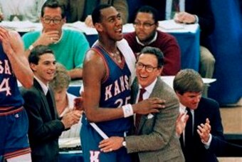 A year after leading Kansas to the NCAA title, Larry Brown saw Kansas banned from the NCAAs because of a plane ticket he had helped a player purchase a few years earlier.