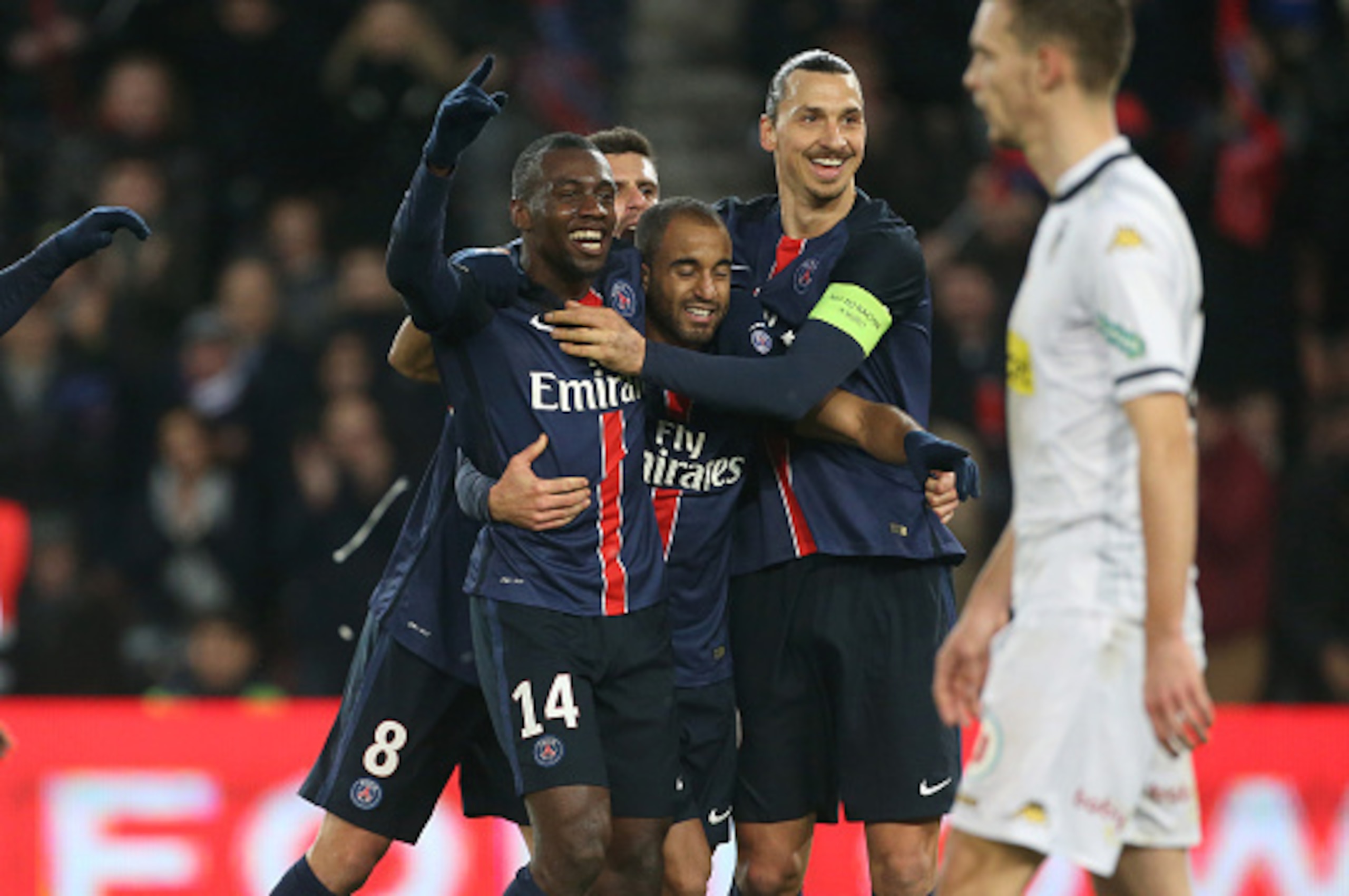 PARIS, FRANCE - JANUARY 23: Lucas Moura of PSG (C) celebrates his goal with Blaise Matuidi and Zlatan Ibrahimovic of PSG during the French Ligue 1 match between Paris Saint-Germain (PSG) and SCO Angers at Parc des Princes stadium on January 23, 2016 in Pa PARIS, FRANCE - JANUARY 23: Lucas Moura of PSG (C) celebrates his goal with Blaise Matuidi and Zlatan Ibrahimovic of PSG during the French Ligue 1 match between Paris Saint-Germain (PSG) and SCO Angers at Parc des Princes stadium on January 23, 2016 in Pa