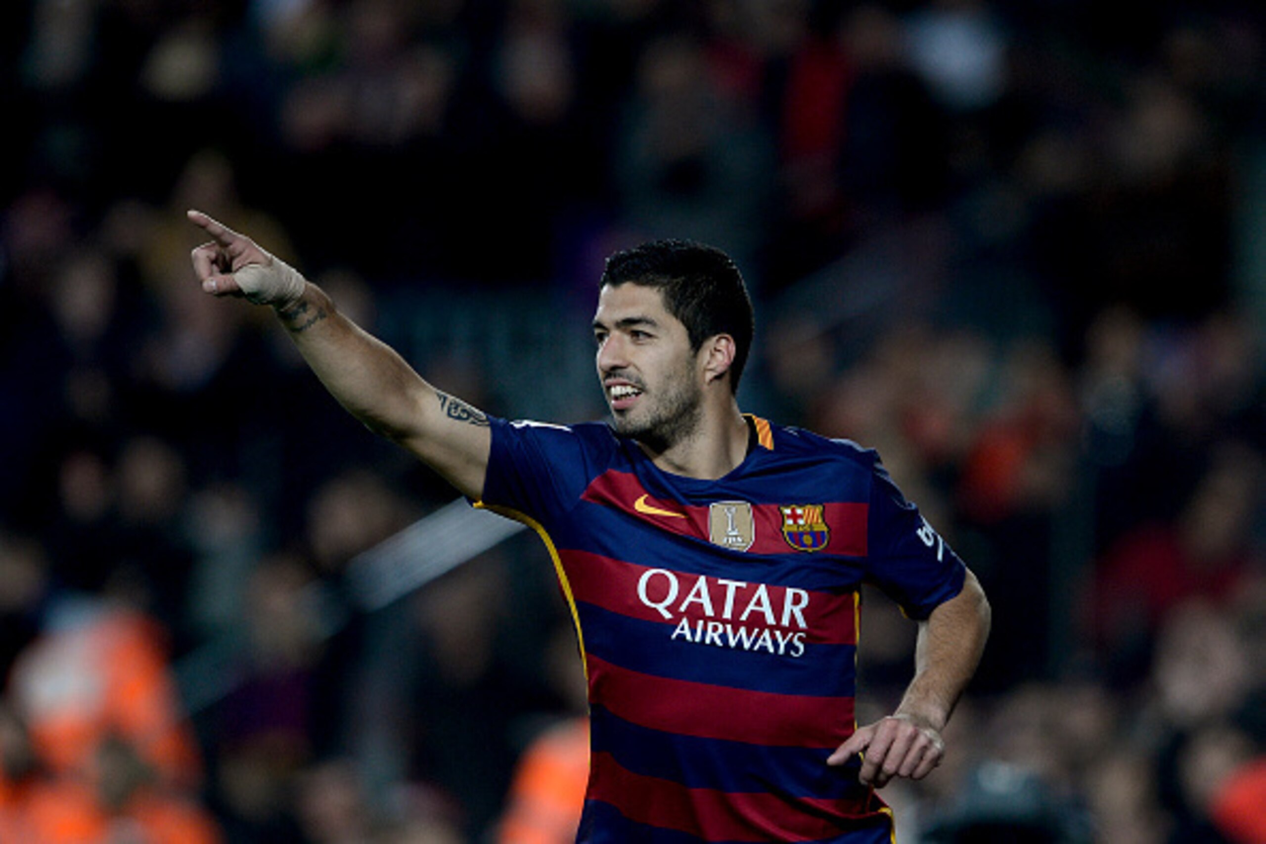 Barcelona's Uruguayan forward Luis Suarez celebrates his goal during the Spanish league football match FC Barcelona vs Athletic Club Bilbao at the Camp Nou stadium in Barcelona on January 17, 2016.   AFP PHOTO/ JOSEP LAGO / AFP / JOSEP LAGO        (Photo 