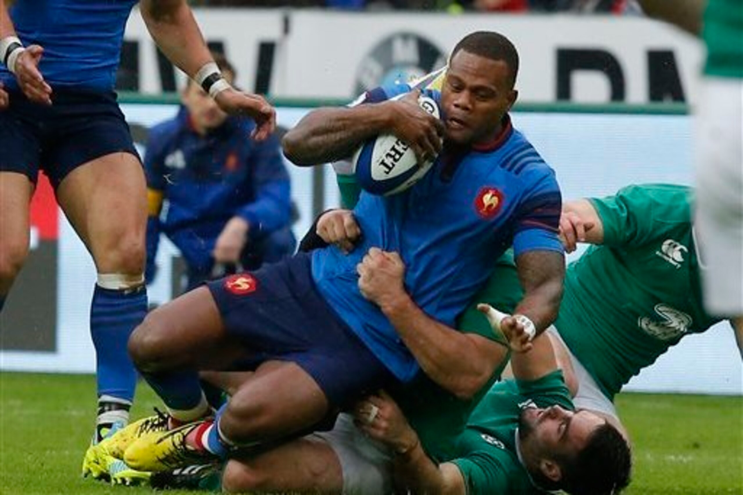 Ireland's Conor Murray tackles France winger Virimi Vakatawa. Ireland's Conor Murray tackles France winger Virimi Vakatawa.