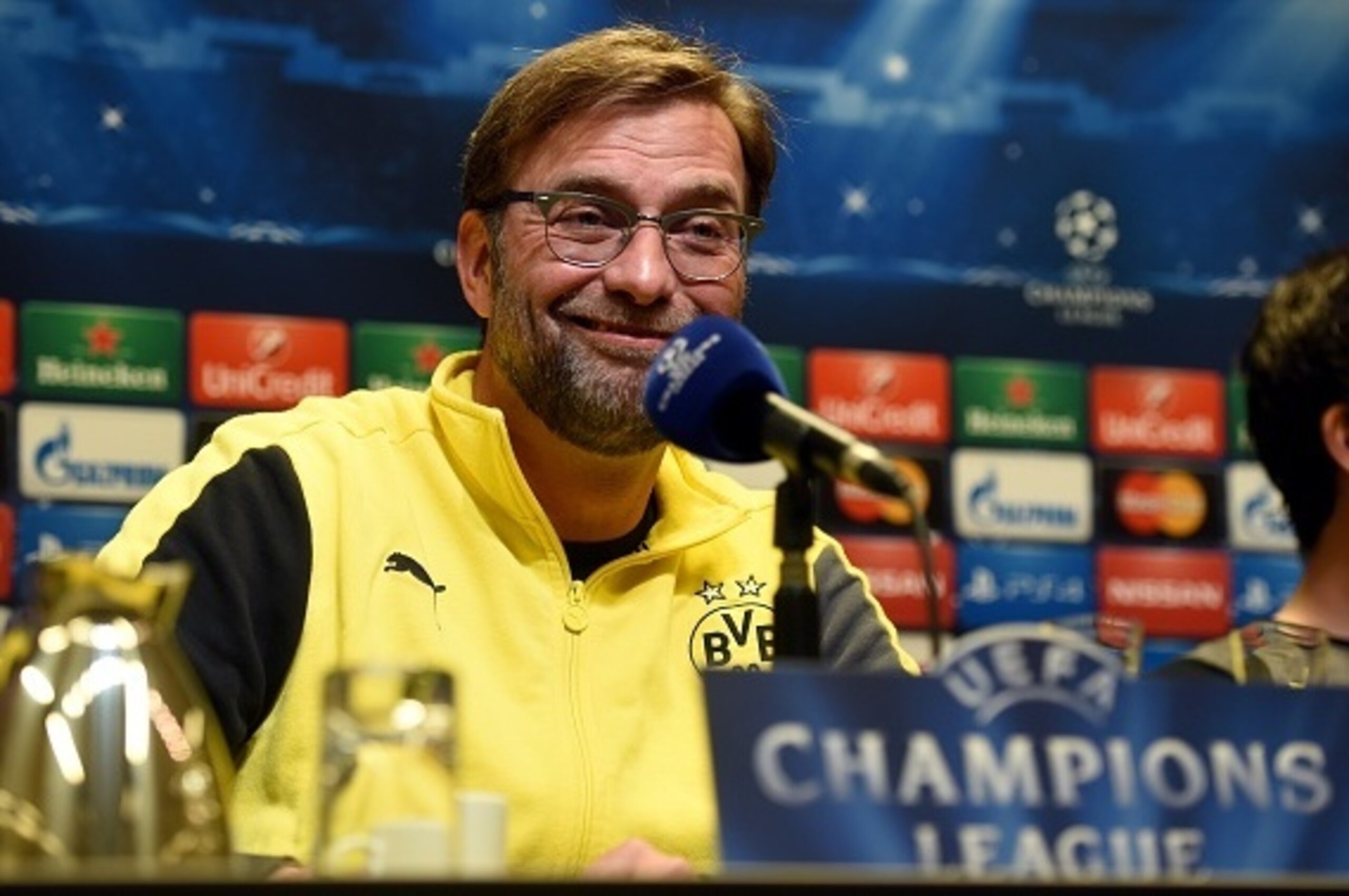 Dortmund's head coach Juergen Klopp addresses a press conference on the eve of the Round of 16, second-leg UEFA Champions League football match Borussia Dortmund vs Juventus Turin in Dortmund, western Germany on March 17, 2015.  AFP PHOTO / PATRIK STOLLAR