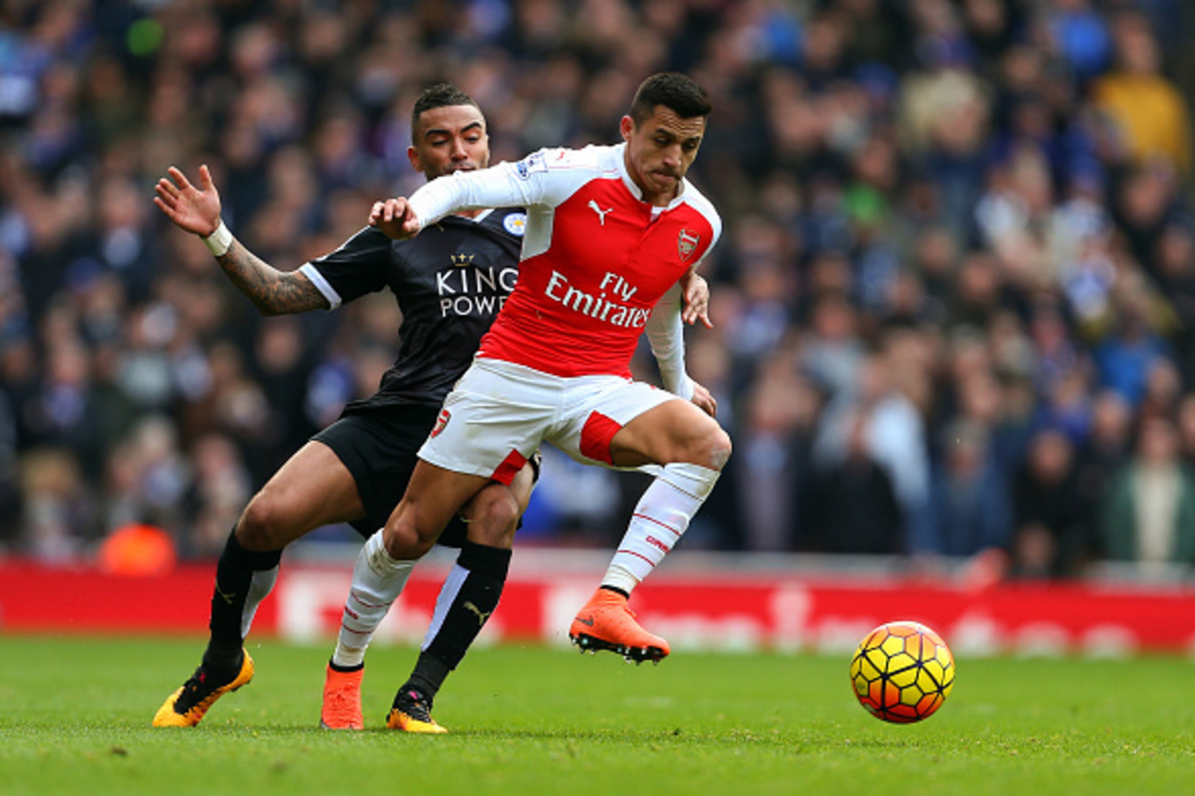 LONDON, ENGLAND - FEBRUARY 14 :  Danny Simpson of Leicester City and Alexis Sanchez of Arsenal during the Barclays Premier League match between Arsenal and Leicester City at the Emirates Stadium on February 14, 2016 in London, England.  (Photo by Catherin
