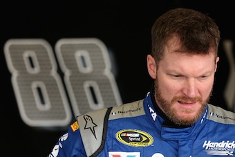 DAYTONA BEACH, FL - FEBRUARY 13:  Dale Earnhardt Jr., driver of the #88 Nationwide Chevrolet, looks on in the garage area during practice for the NASCAR Sprint Cup Series Daytona 500 at Daytona International Speedway on February 13, 2016 in Daytona Beach,