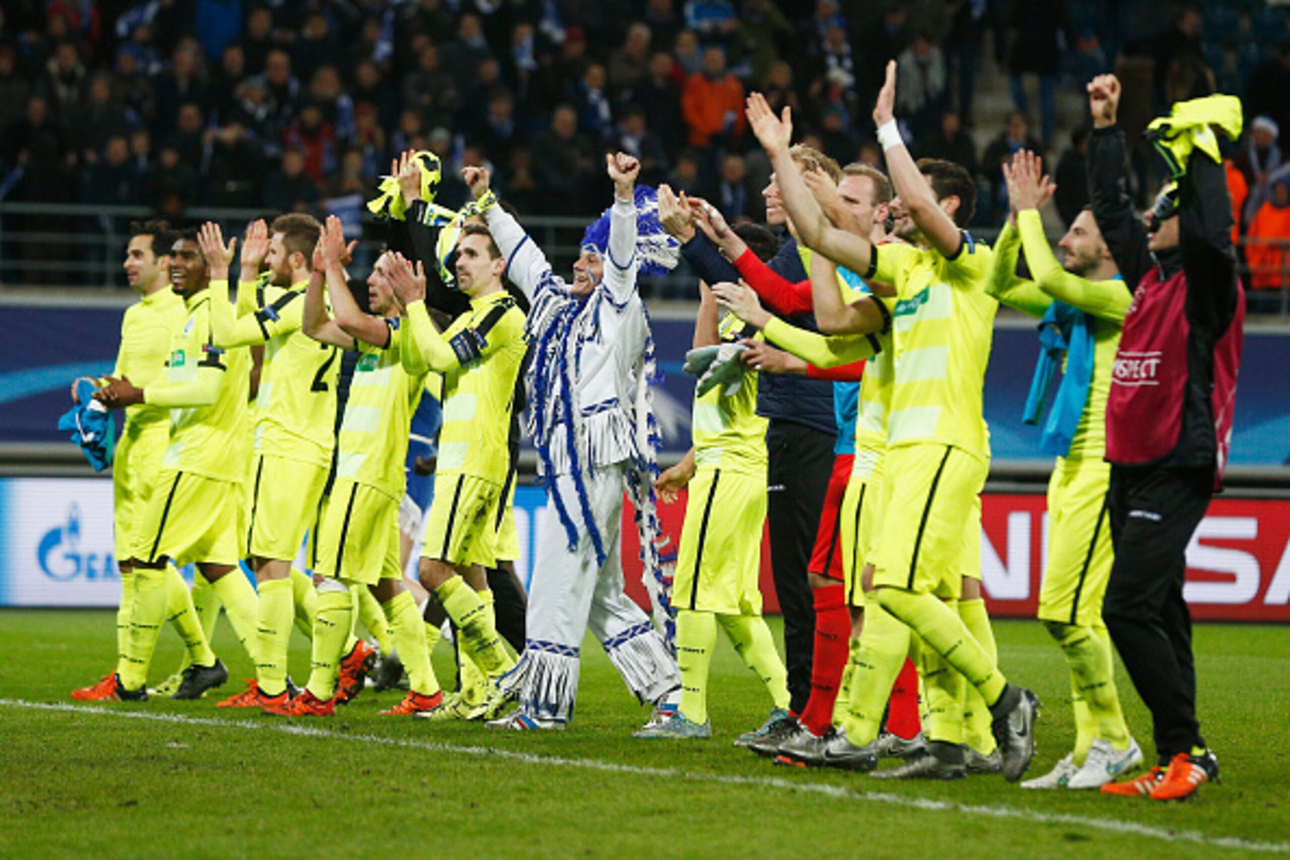 GHENT, BELGIUM - DECEMBER 09:  Gent players celebrate after victory in the group H UEFA Champions League match between KAA Gent and Football Club Zenit Saint Petersburg held at Ghelamco Arena, on December 9, 2015 in Gent, Belgium.  (Photo by Dean Mouhtaro