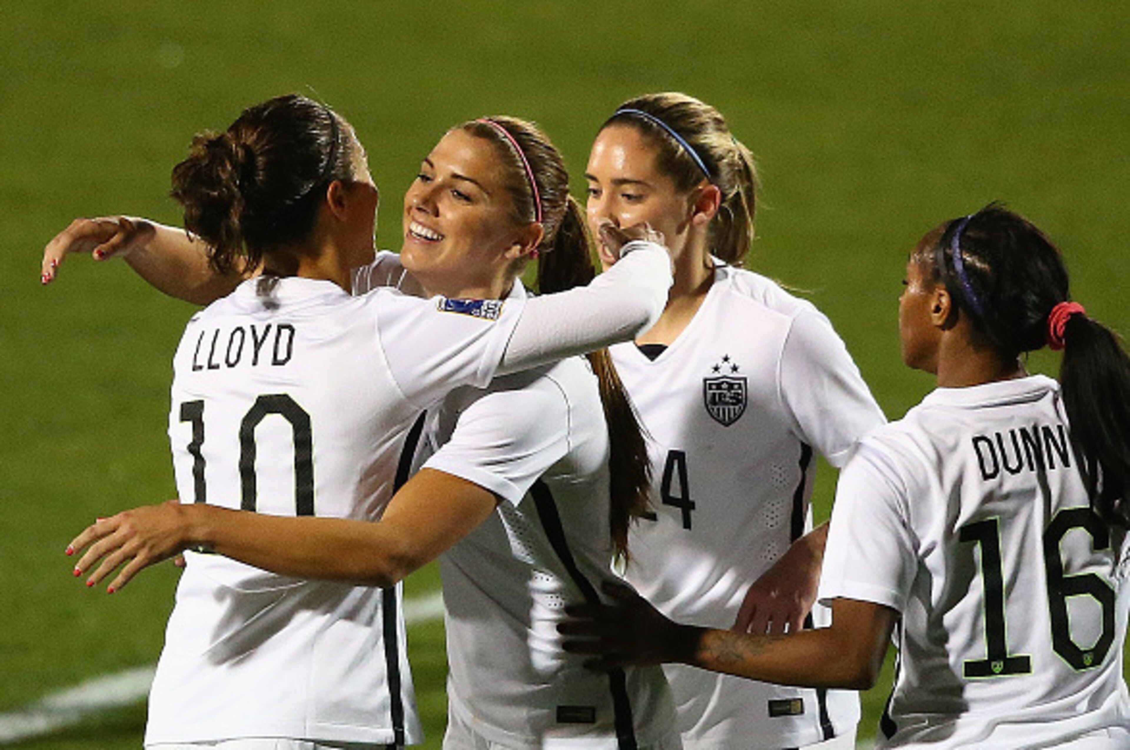 FRISCO, TX - FEBRUARY 10:  Alex Morgan #13 of USA celebrates her goal with Carli Lloyd #10, Morgan Brian #14 and Crystal Dunn #16 against Costa Rica during the 2016 CONCACAF Women's Olympic Qualifying at Toyota Stadium on February 10, 2016 in Frisco, Texa