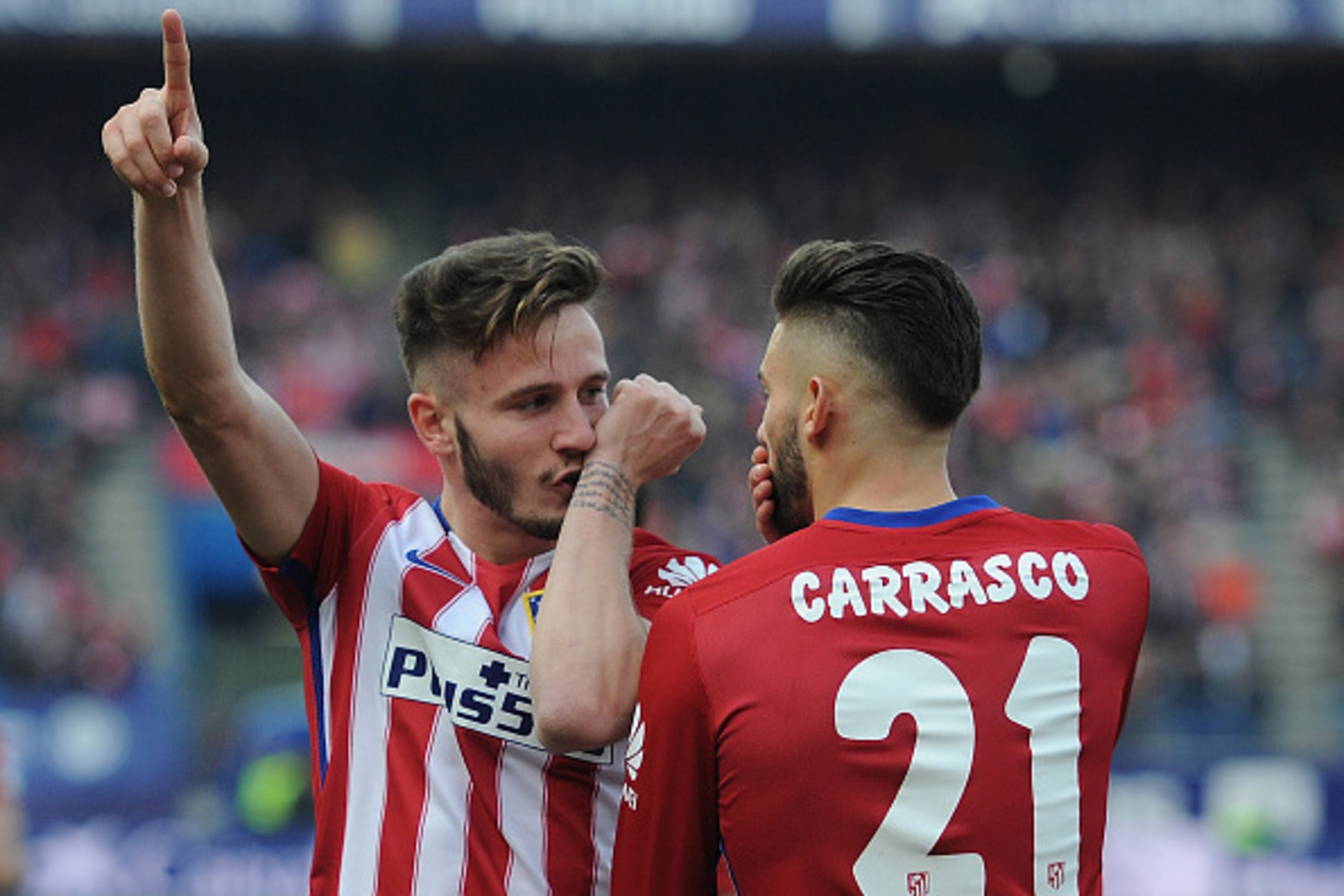 MADRID, SPAIN - FEBRUARY 06: Saul Niguez of Club Atletico de Madrid celebrates with Yannick Carrasco after scoring his team's 2nd goal during the La Liga match between Club Atletico de Madrid and SD Eibar at Vicente Calderon Stadium on February 6, 2016 i MADRID, SPAIN - FEBRUARY 06: Saul Niguez of Club Atletico de Madrid celebrates with Yannick Carrasco after scoring his team's 2nd goal during the La Liga match between Club Atletico de Madrid and SD Eibar at Vicente Calderon Stadium on February 6, 2016 i