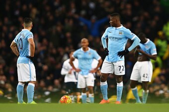 MANCHESTER, ENGLAND - FEBRUARY 14:  Kelechi Iheanacho and Sergio Aguero of Manchester City look dejected after the second Spurs goal during the Barclays Premier League match between Manchester City and Tottenham Hotspur at Etihad Stadium on February 14, 2