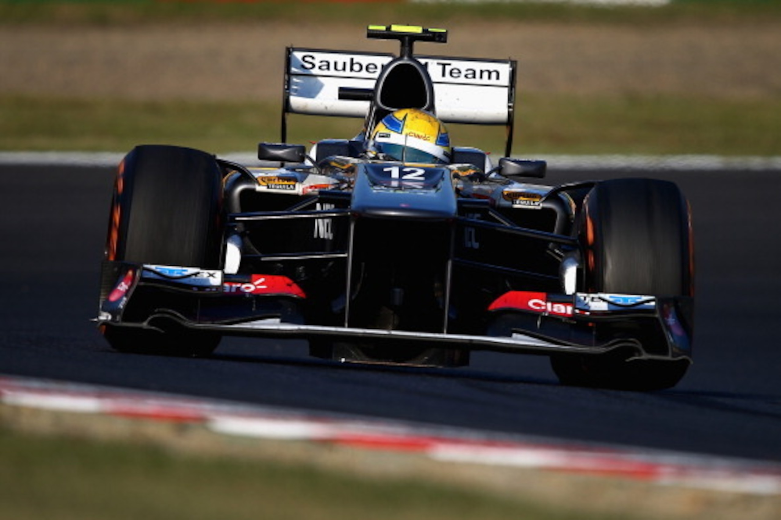 SUZUKA, JAPAN - OCTOBER 13:  Esteban Gutierrez of Mexico and Sauber F1 drives during the Japanese Formula One Grand Prix at Suzuka Circuit on October 13, 2013 in Suzuka, Japan.  (Photo by Clive Mason/Getty Images)
