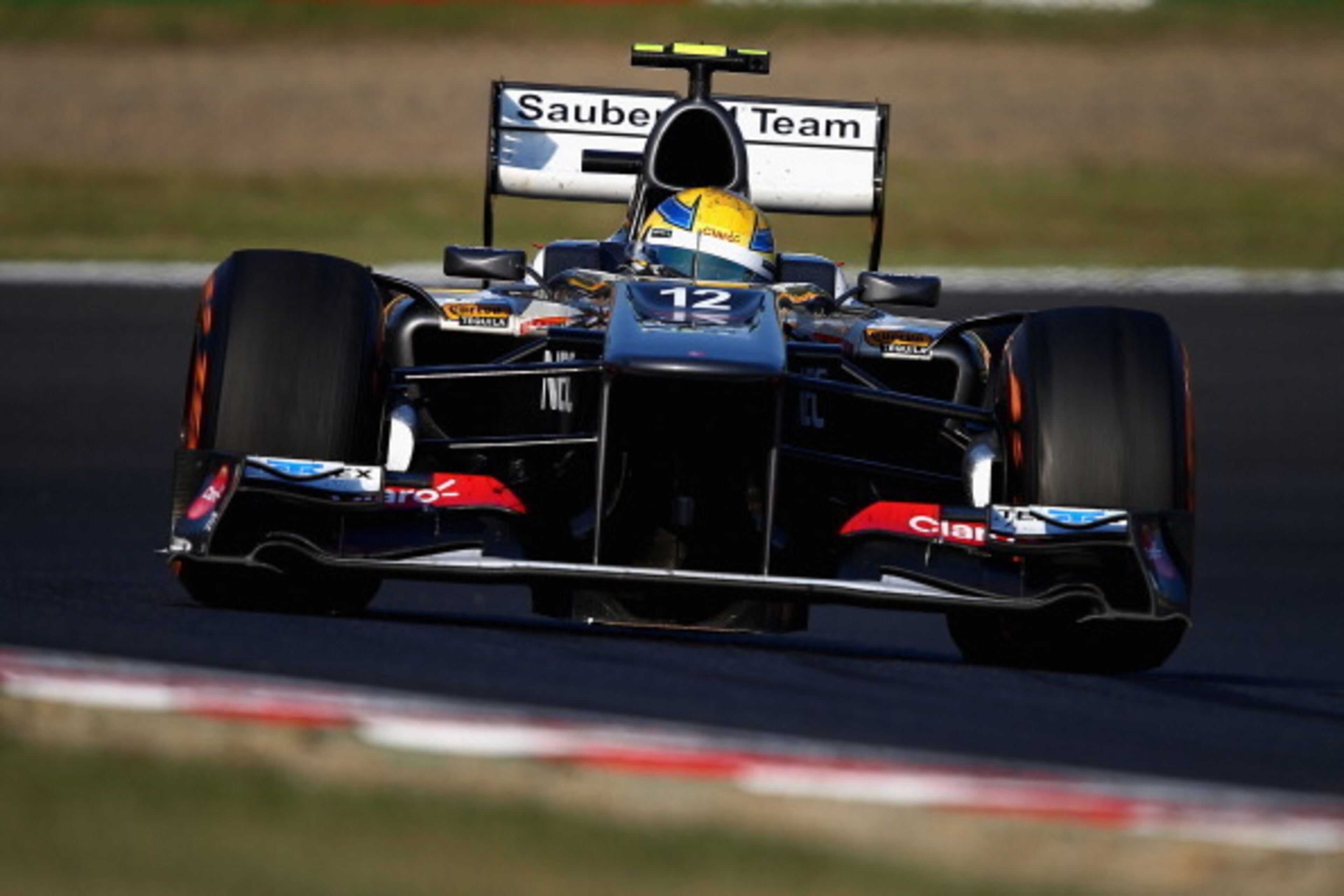 SUZUKA, JAPAN - OCTOBER 13:  Esteban Gutierrez of Mexico and Sauber F1 drives during the Japanese Formula One Grand Prix at Suzuka Circuit on October 13, 2013 in Suzuka, Japan.  (Photo by Clive Mason/Getty Images)