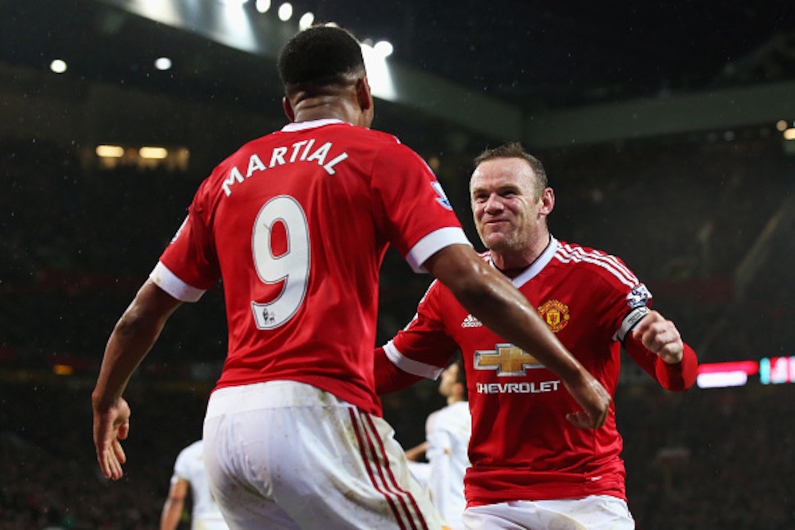 MANCHESTER, ENGLAND - JANUARY 02: Wayne Rooney (R) of Manchester United celebrates scoring his team's second goal with his team mate Anthony Martial (L) during the Barclays Premier League match between Manchester United and Swansea City at Old Trafford o MANCHESTER, ENGLAND - JANUARY 02: Wayne Rooney (R) of Manchester United celebrates scoring his team's second goal with his team mate Anthony Martial (L) during the Barclays Premier League match between Manchester United and Swansea City at Old Trafford o