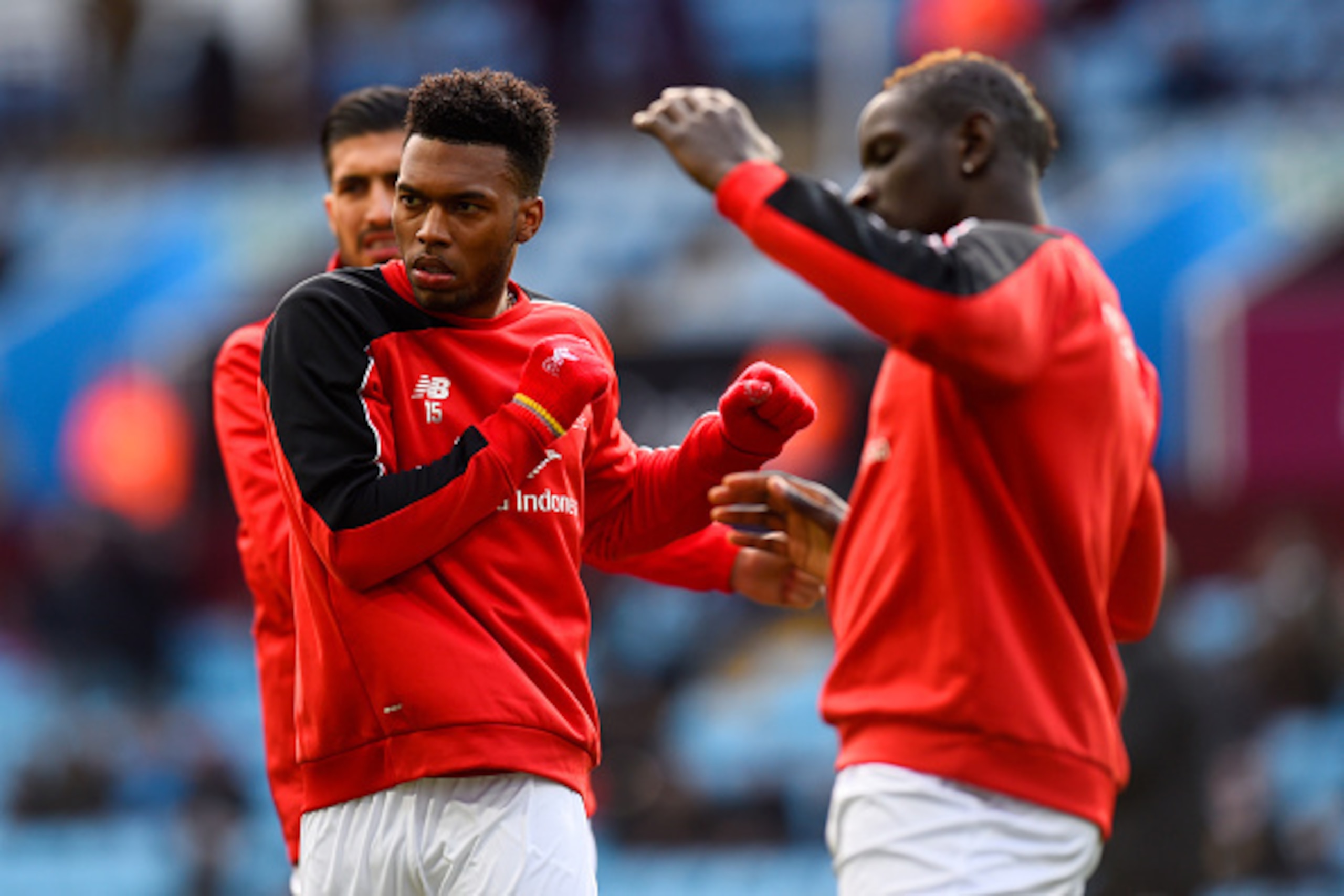 BIRMINGHAM, ENGLAND - FEBRUARY 14:  Daniel Sturridge of Liverpool stretches with Emre Can and Mamadou Sakho of Liverpool during the warm-up before the Barclays Premier League match between Aston Villa and Liverpool at Villa Park on February 14, 2016 in Bi