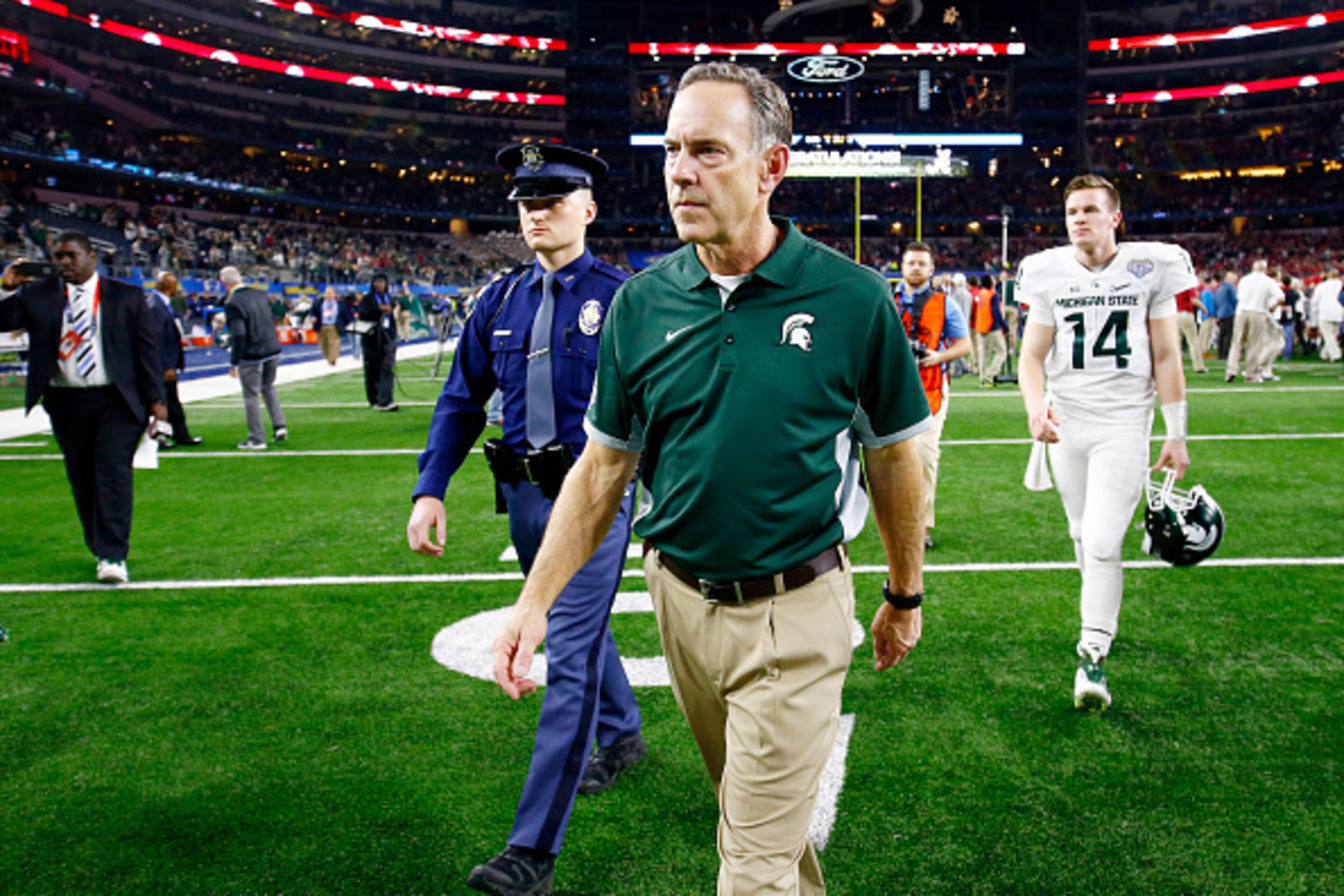 ARLINGTON, TX - DECEMBER 31: Head coach Mark Dantonio walks off the field after losing 38-0 to the Alabama Crimson Tide during the Goodyear Cotton Bowl at AT&T Stadium on December 31, 2015 in Arlington, Texas. (Photo by Scott Halleran/Getty Images) ARLINGTON, TX - DECEMBER 31: Head coach Mark Dantonio walks off the field after losing 38-0 to the Alabama Crimson Tide during the Goodyear Cotton Bowl at AT&T Stadium on December 31, 2015 in Arlington, Texas. (Photo by Scott Halleran/Getty Images)