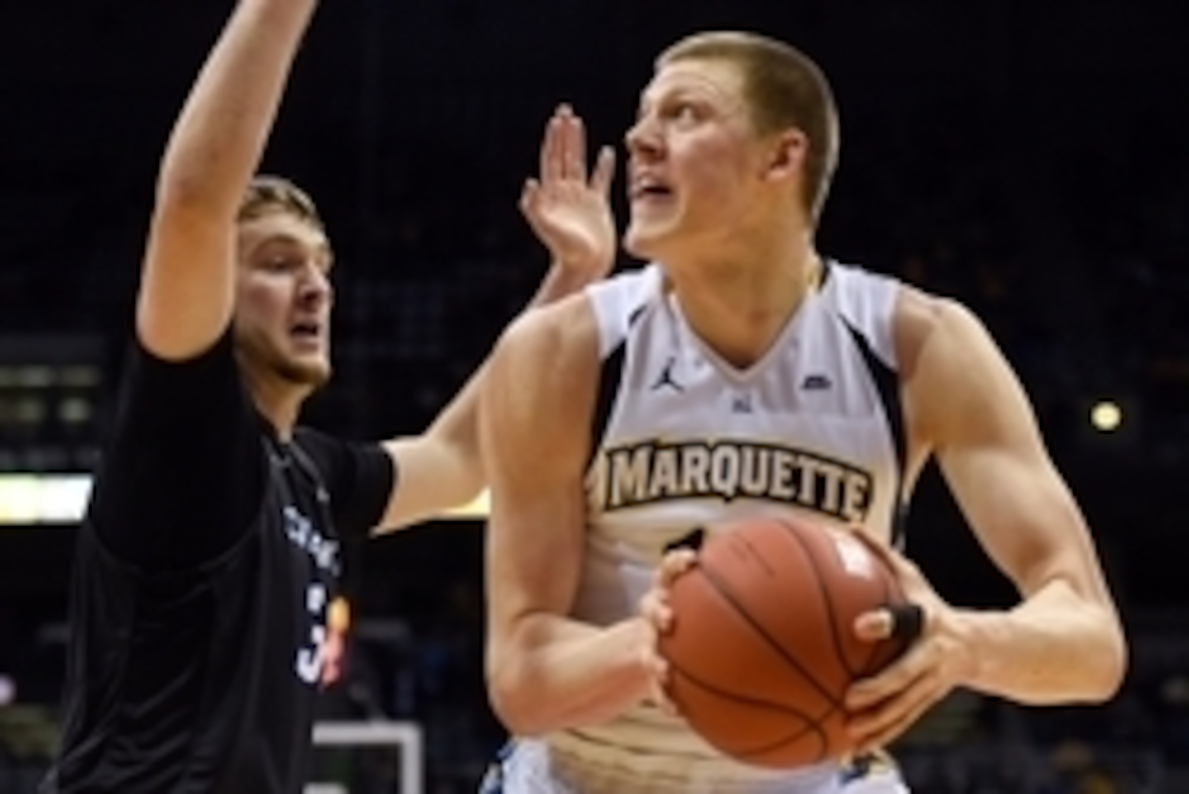 Feb 13, 2016; Milwaukee, WI, USA;  Marquette Golden Eagles forward Henry Ellenson (13) looks for a shot against Creighton Bluejays forward Toby Hegner (32) in the first half at BMO Harris Bradley Center. Mandatory Credit: Benny Sieu-USA TODAY Sports