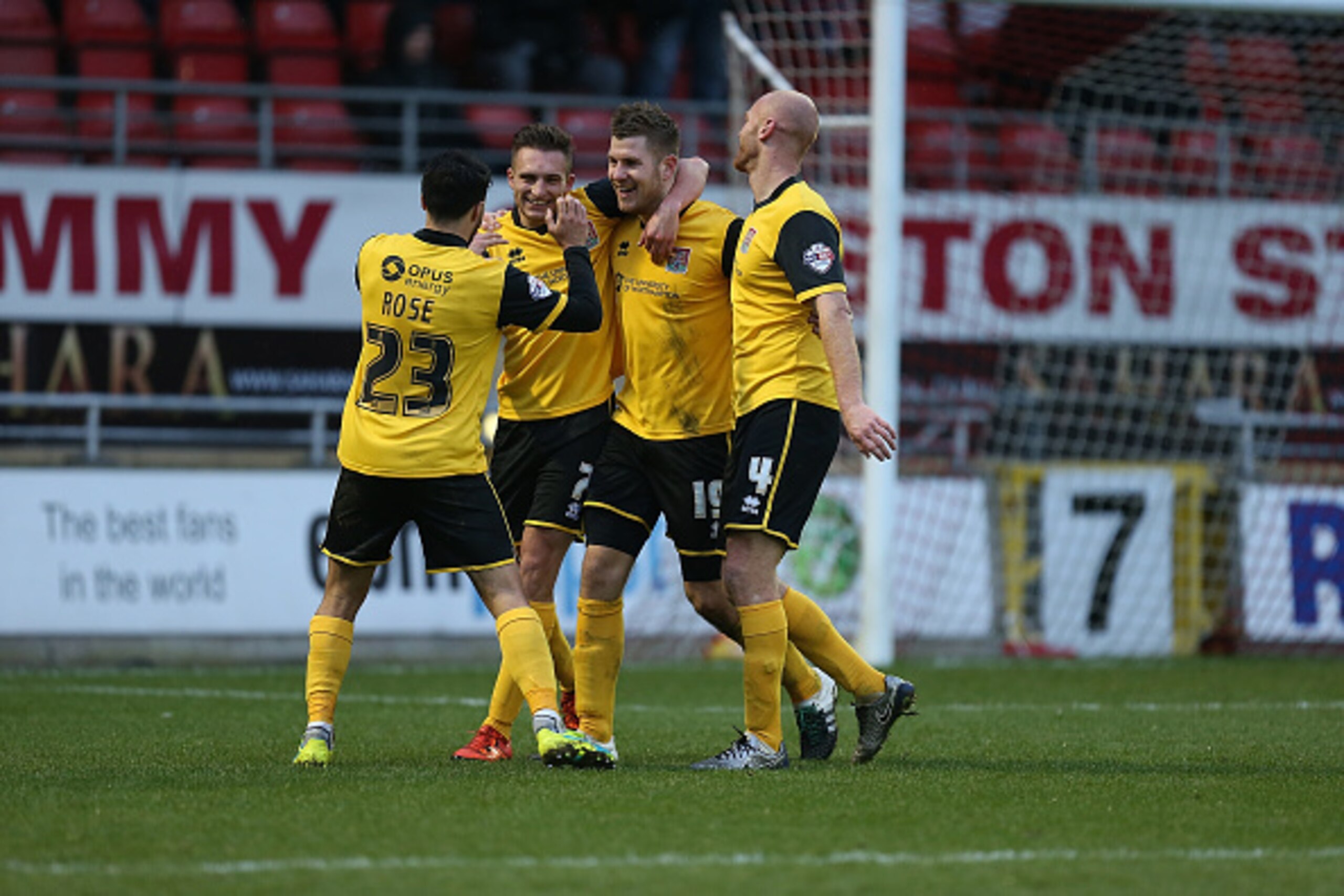 LONDON, ENGLAND - FEBRUARY 13:  James Collins of Northampton Town celebrates with team mates Danny Rose, Jason Taylor and Lawson D'Ath after scoring his second and his sides fourth goal during the Sky Bet League Two match between Leyton orient and Northam