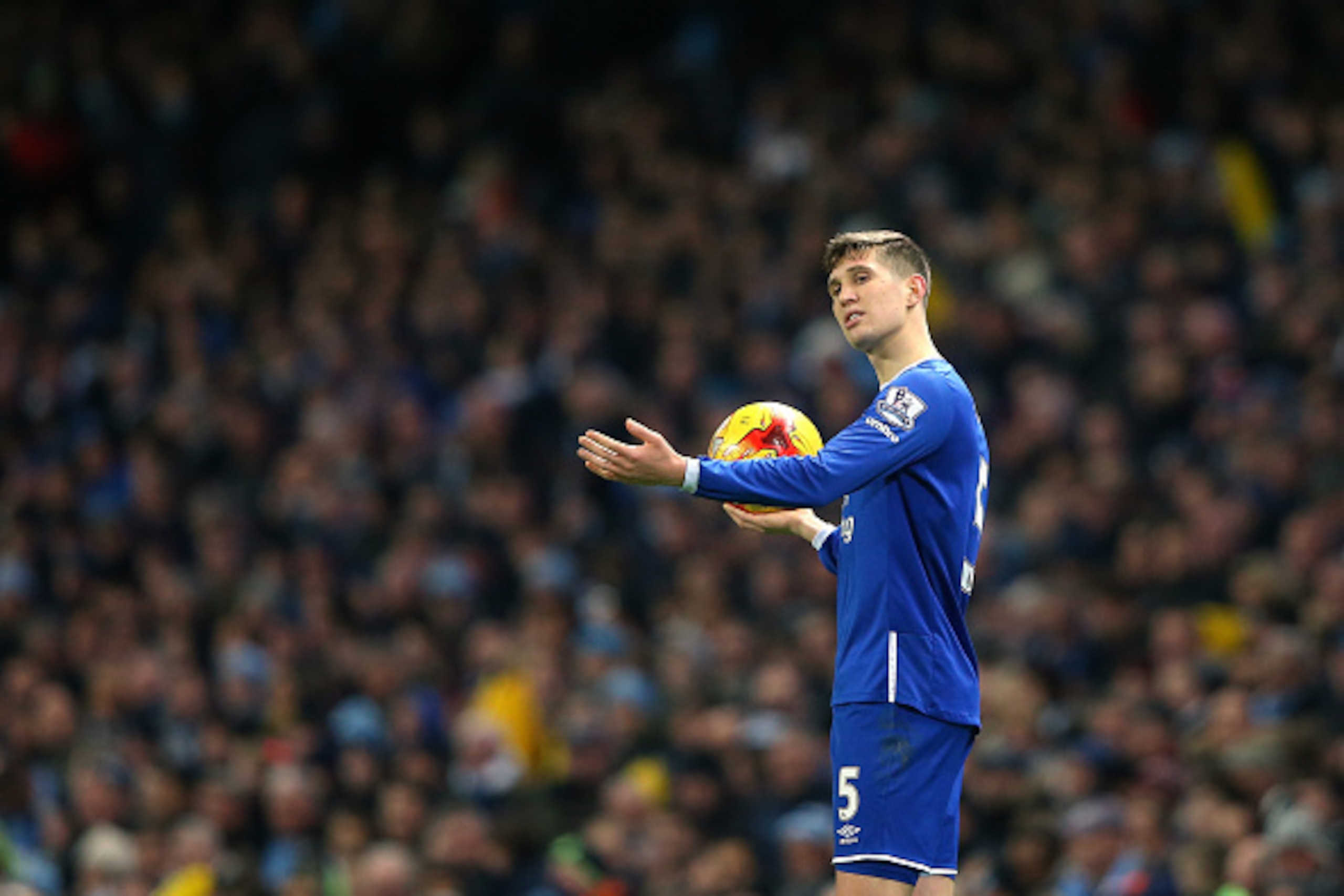 MANCHESTER, ENGLAND - JANUARY 27:  John Stones of Everton takes a throw in during the Capital One Cup Semi Final Second Leg match between Manchester City and Everton at Etihad Stadium on January 27, 2016 in Manchester, England.  (Photo by Alex Livesey/Get