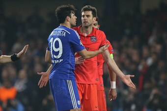 LONDON, ENGLAND - MARCH 11: Diego Costa of Chelsea argues with Thiago Motta of PSG during the UEFA Champions League Round of 16, second leg match between Chelsea FC and Paris Saint-Germain FC at Stamford Bridge stadium on March 11, 2015 in London, England