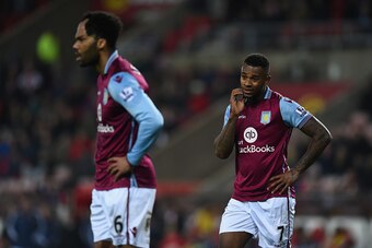 SUNDERLAND, ENGLAND - JANUARY 02: Villa players Joleon Lescott (l) and Leandro Bacuna react during the Barclays Premier League match between Sunderland and Aston Villa at Stadium of Light on January 2, 2016 in Sunderland, England.  (Photo by Stu Forster/G