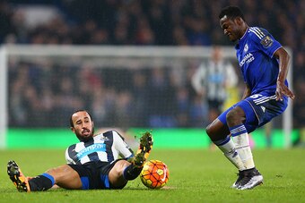 LONDON, ENGLAND - FEBRUARY 13:  Baba Rahman of Chelsea and Andros Townsend of Newcastle United compete for the ball during the Barclays Premier League match between Chelsea and Newcastle United at Stamford Bridge on February 13, 2016 in London, England.  