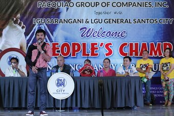 GENERAL SANTOS, PHILIPPINES - MAY 15: Boxer Manny Pacquiao speaks at the crowd inside a shopping mall in his hometown on May 15, 2015 in General Santos, Philippines. Pacquiao lost his title unification fight against Floyd Mayweather on May 2 at MGM Grand 