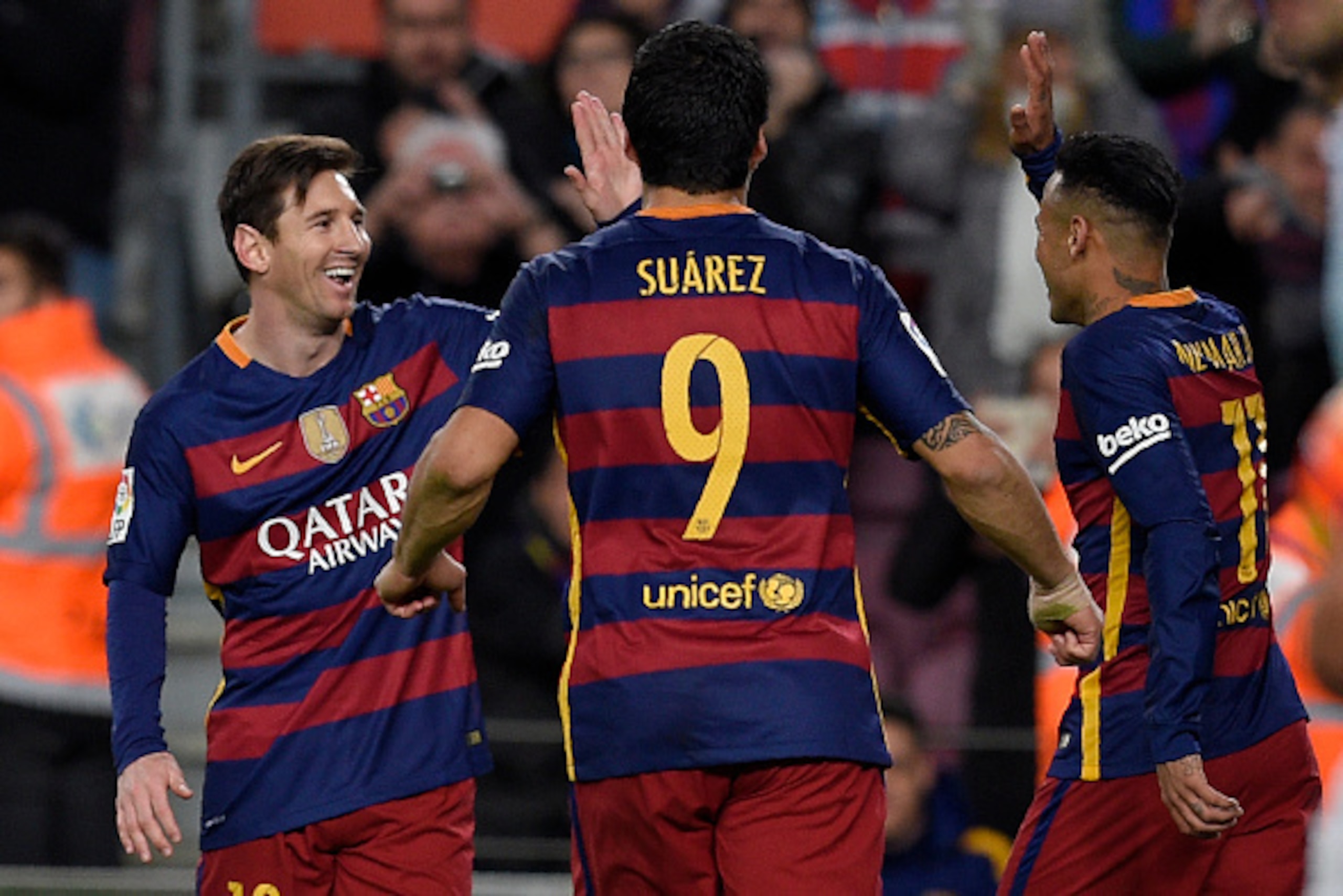 Barcelona's Uruguayan forward Luis Suarez (C) runs to celebrate a goal with Barcelona's Brazilian forward Neymar (R) and Barcelona's Argentinian forward Lionel Messi during the Spanish league football match FC Barcelona vs RC Celta de Vigo at the Camp Nou Barcelona's Uruguayan forward Luis Suarez (C) runs to celebrate a goal with Barcelona's Brazilian forward Neymar (R) and Barcelona's Argentinian forward Lionel Messi during the Spanish league football match FC Barcelona vs RC Celta de Vigo at the Camp Nou